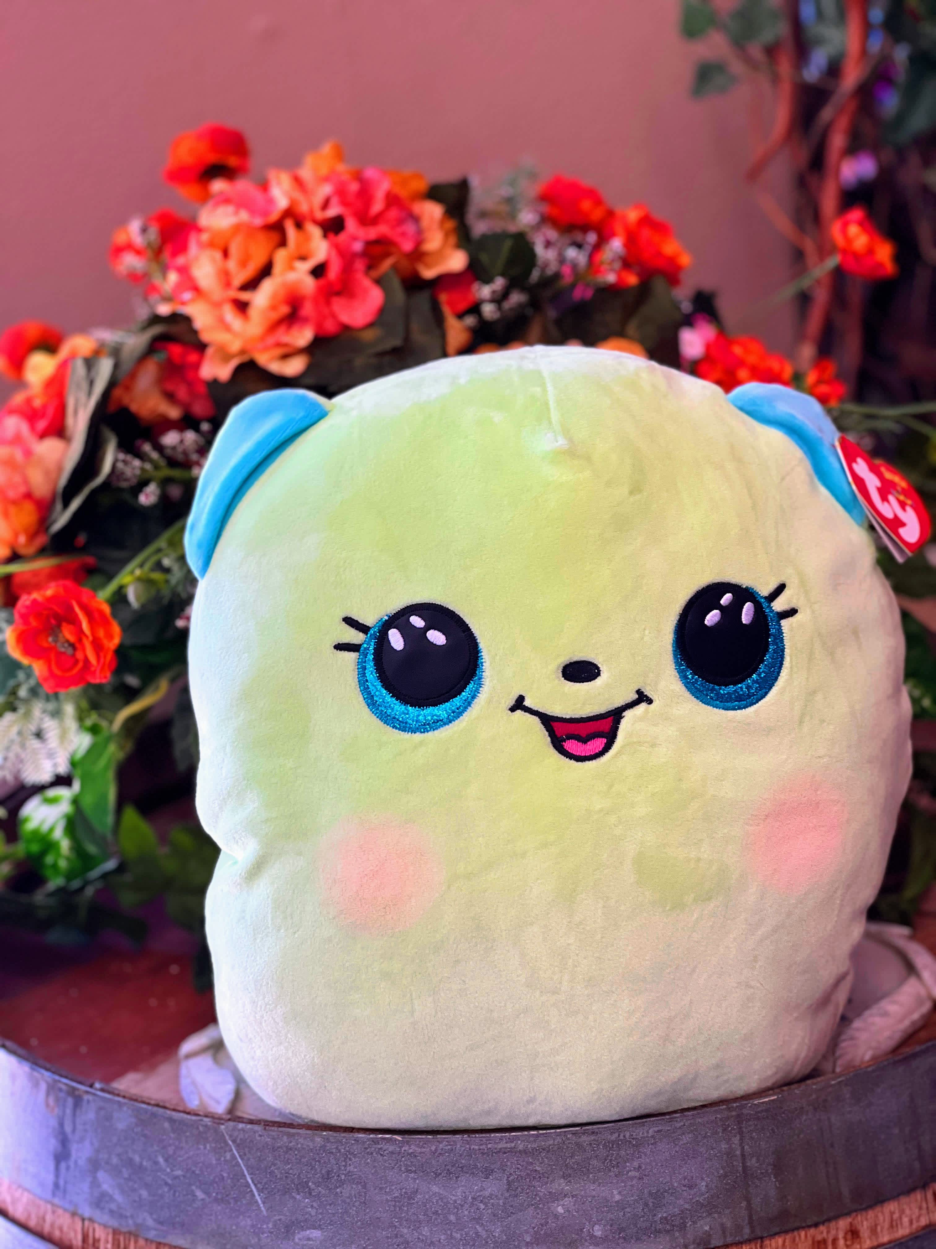 LARGE TY Beanie Boo Bear "Clover" LARGE TY Beanie Boo Bear "Clover" - Each night, snuggle Clover as you sleep so you can wake up to a cheerful smile every morning! Bright green with blue ears will shine and stand out in any decor. Hibernating with this cuddly bear will be so much fun. Size: