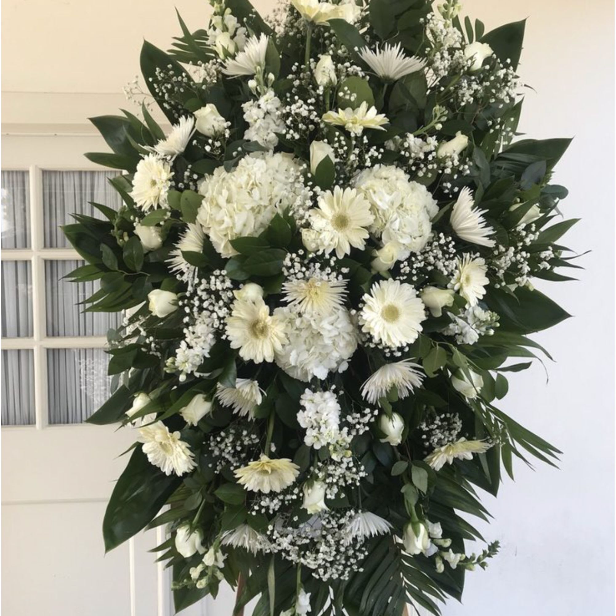 Sympathy Spray Large  - Honor a lifetime of faithful devotion with our beautiful standing sympathy arrangement. &nbsp;It is a beautiful way to offer peace and comfort during a difficult time. You may request any colors pf flowers - call us (310) 853-3396 Size 30 inches without stand