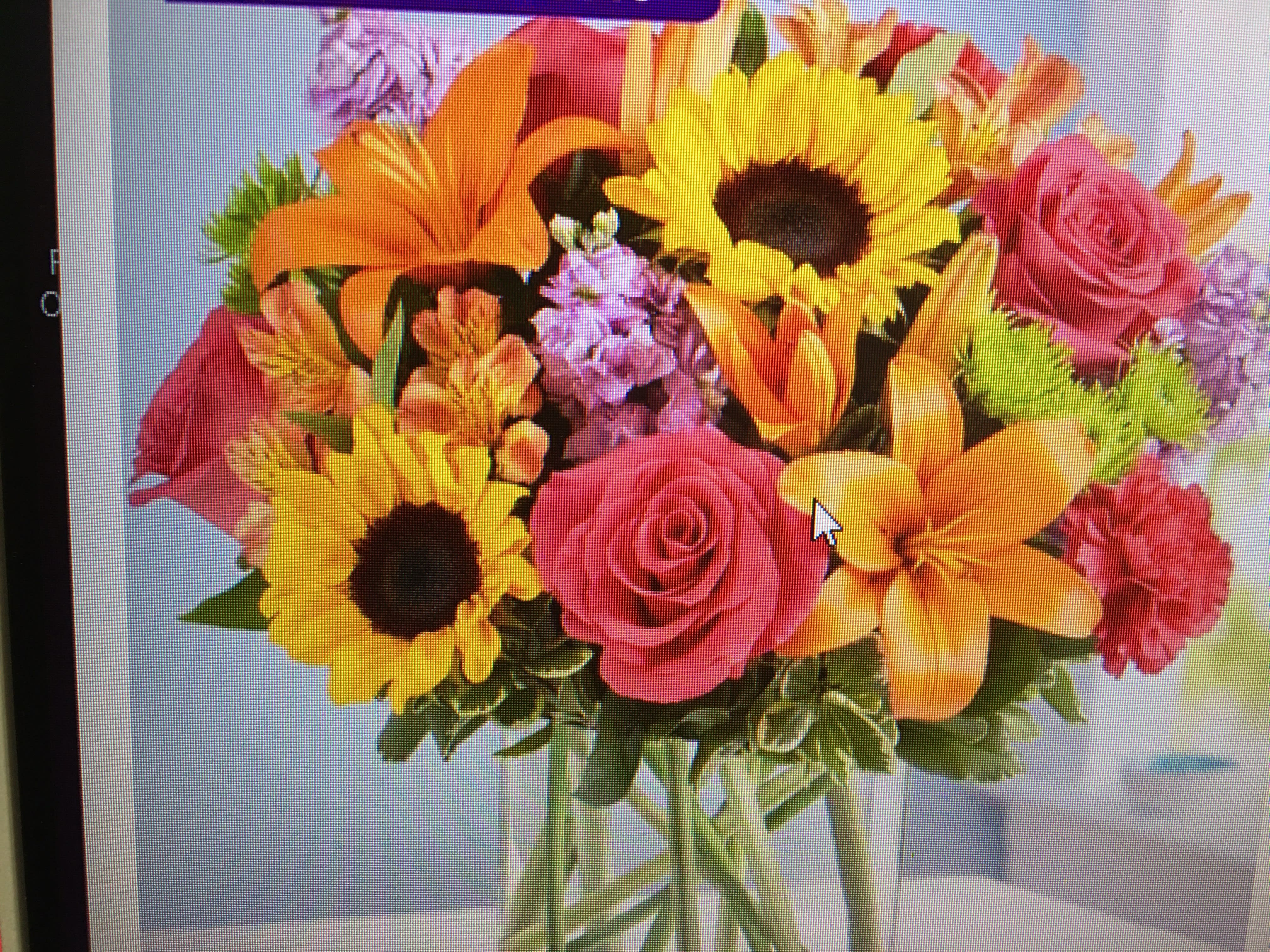 Floral embrace - Sunflowers Lillie’s roses alstroemeria in a clear vase