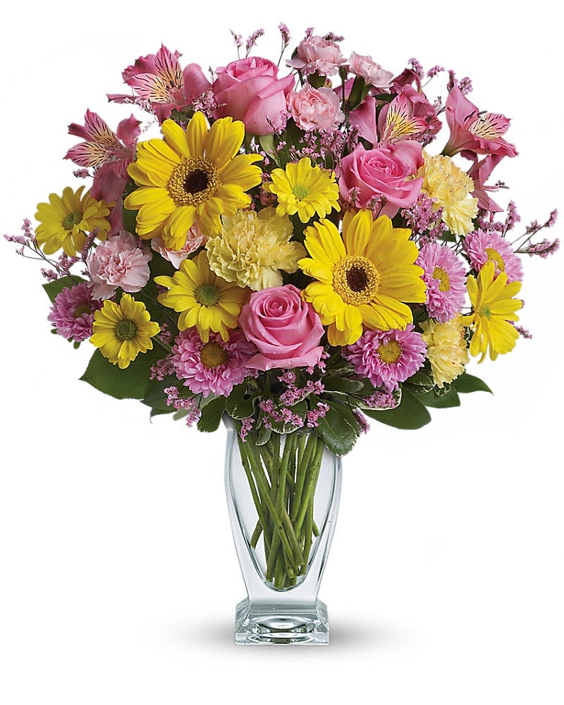 Teleflora's Dazzling Day Bouquet Teleflora's Dazzling Day Bouquet - Dazzle someone special with a stylish and bright bouquet! These delightful blossoms in shades of pink and yellow are delivered in a gorgeous glass vase. Pink spray roses, yellow gerberas and daisy spray chrysanthemums, dark pink alstroemeria, light yellow carnations, light pink matsumoto asters and miniature carnations are a mere sampling of what's included in this dazzling gift. Delivered in a glass couture vase.