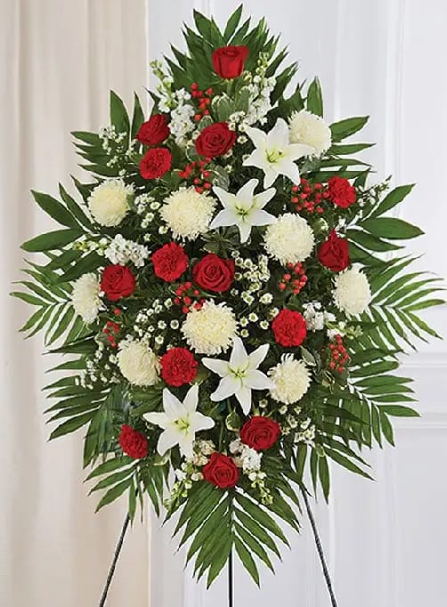 Heart &amp; Soul  - Our Red and White Sympathy Spray is a simple yet beautiful tribute to honor a loved one. Red and white flowers accentuate the spray and are artfully arranged. It will reflect the love and compassion you wish to express.