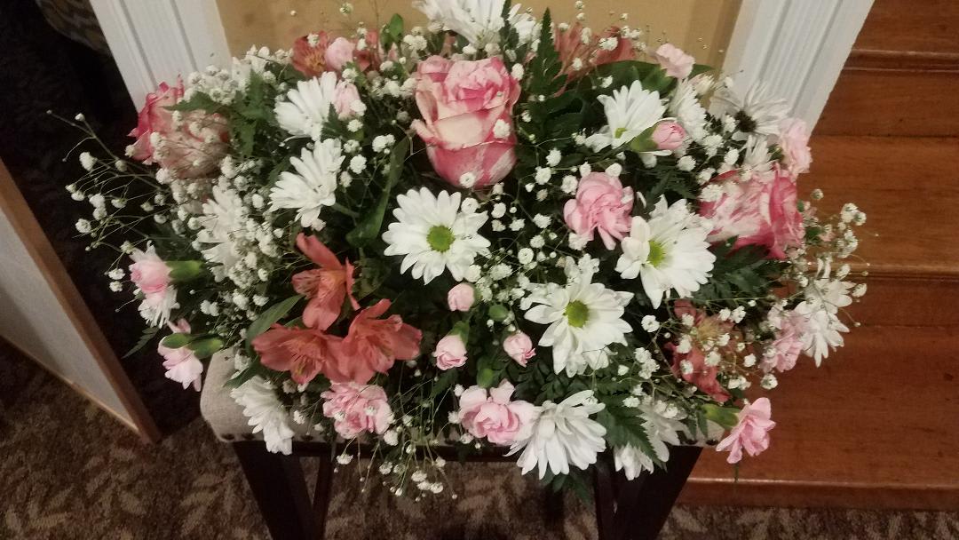 Beautiful Girl - Small spray for this solemn occasion.  You just let us know the color scheme you want to send your loving tribute.