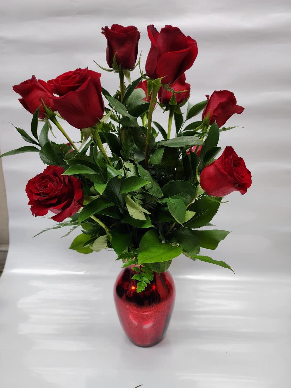 12 red roses 12 red roses - 12 red roses, with a red base and greeneries