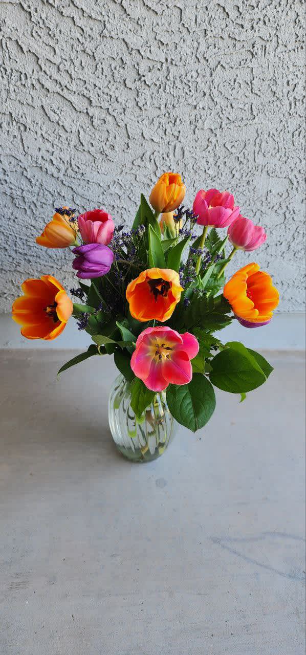 Just Tulips Just Tulips - 15 stems of assorted tulips with fillers, salad tip in a clear vase