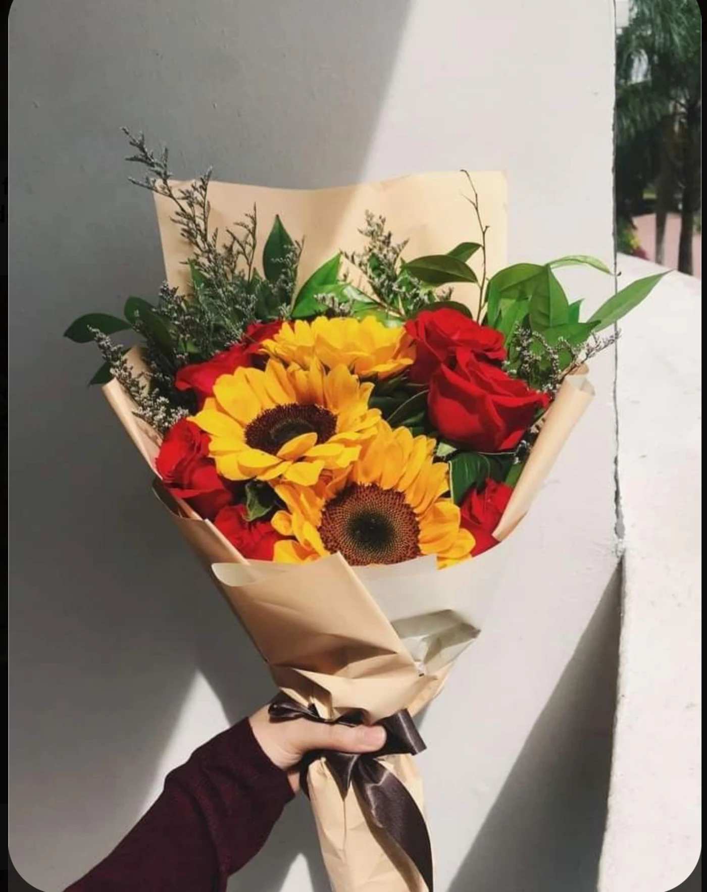 Sunflower Beauty - Beautiful Red Roses, sunflowers and greenery wrapped. 
