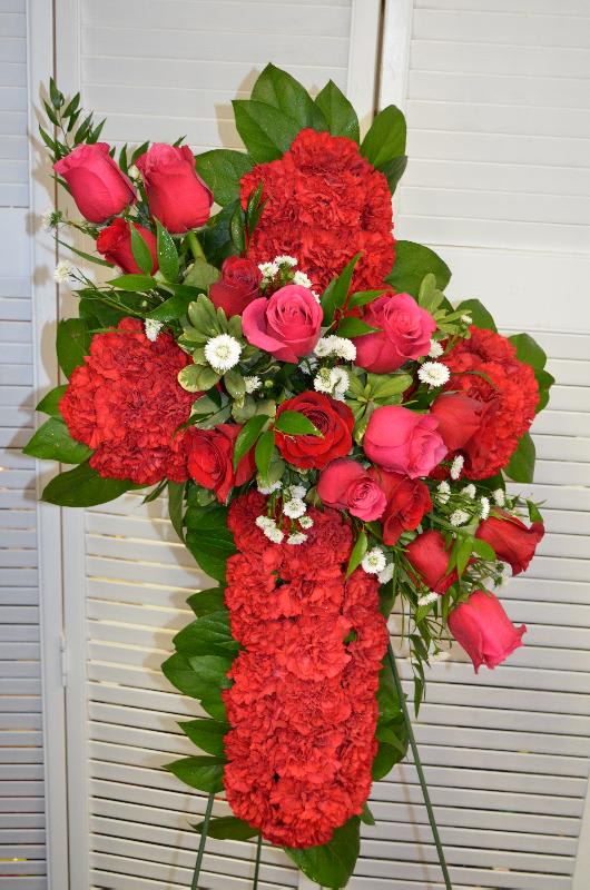 Sympathy Cross Red Sympathy Cross Red - Standing funeral cross made of roses & Carnations.