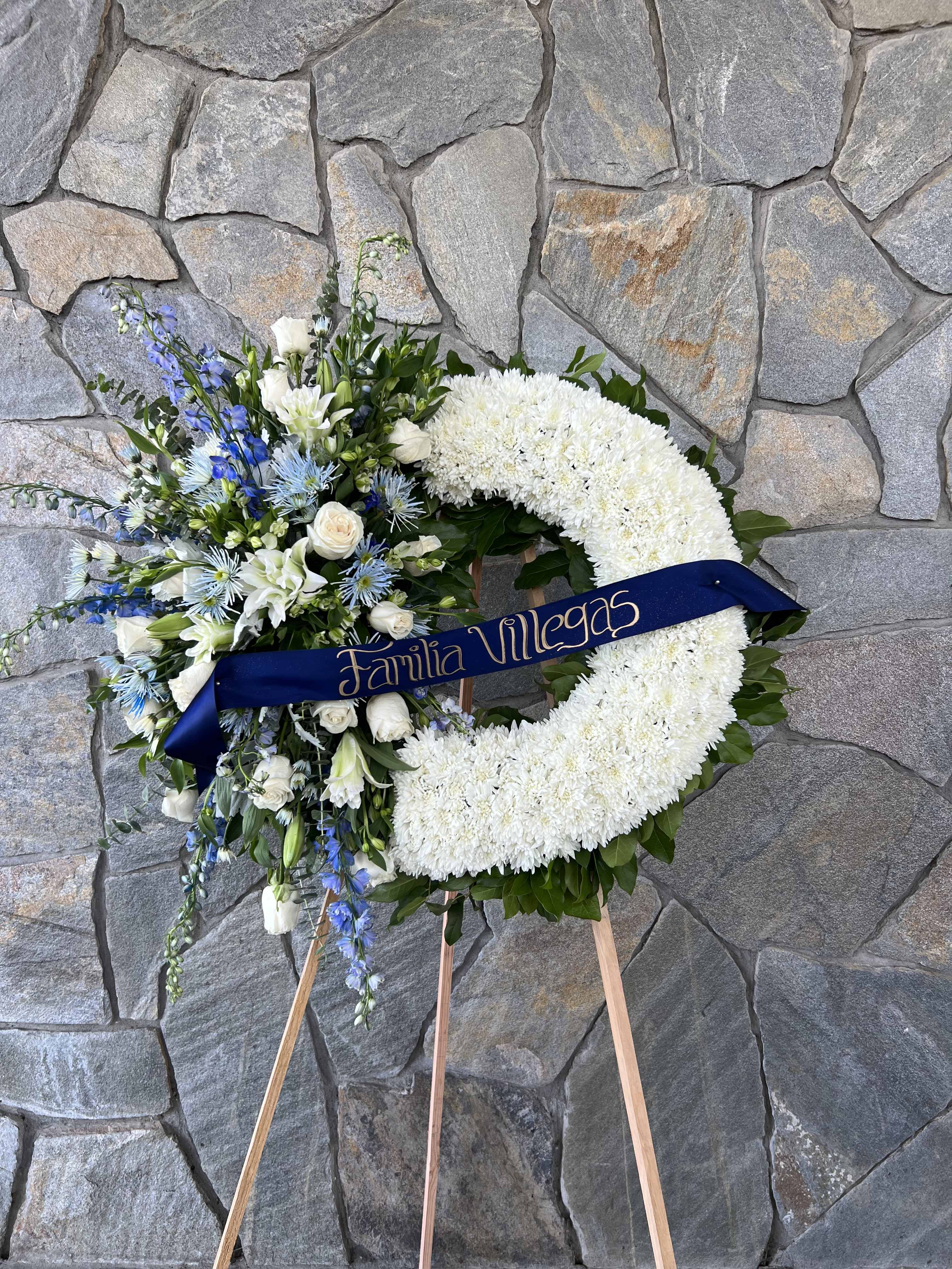Stand Navy Blue Wreath. - Blue and White Flowers. 30&quot; Approx. Stand and Ribbon.