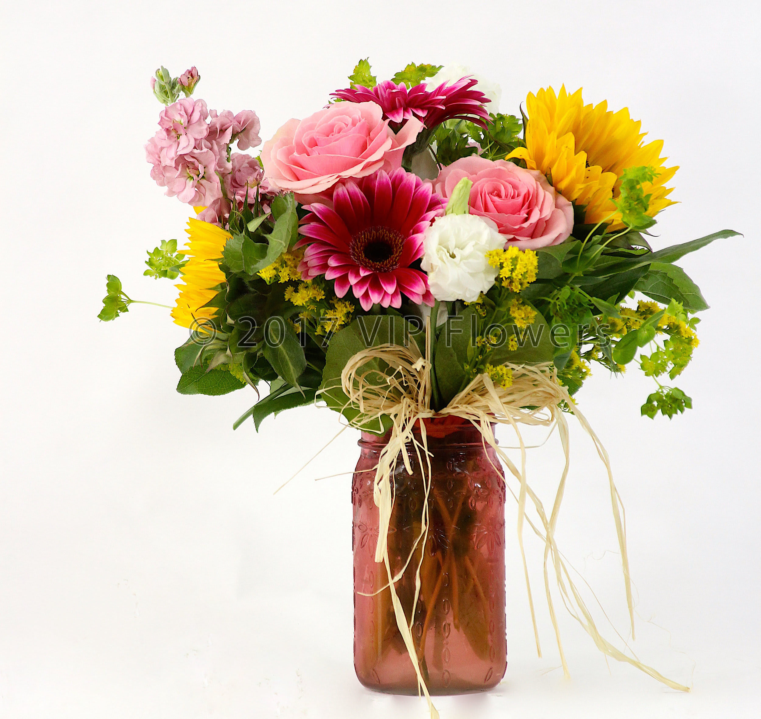Garden Dash - Flowers Included:  Pink Gerberas Pink Roses Sunflowers Purple Stock Yellow mini mums       Substitutions may be necessary to ensure your arrangement or specialty gift is delivered in a timely manner. The utmost care and attention is given to your order to ensure that it is as similar as possible to the requested item (Please note that some flowers and colors may vary due to seasonality.)