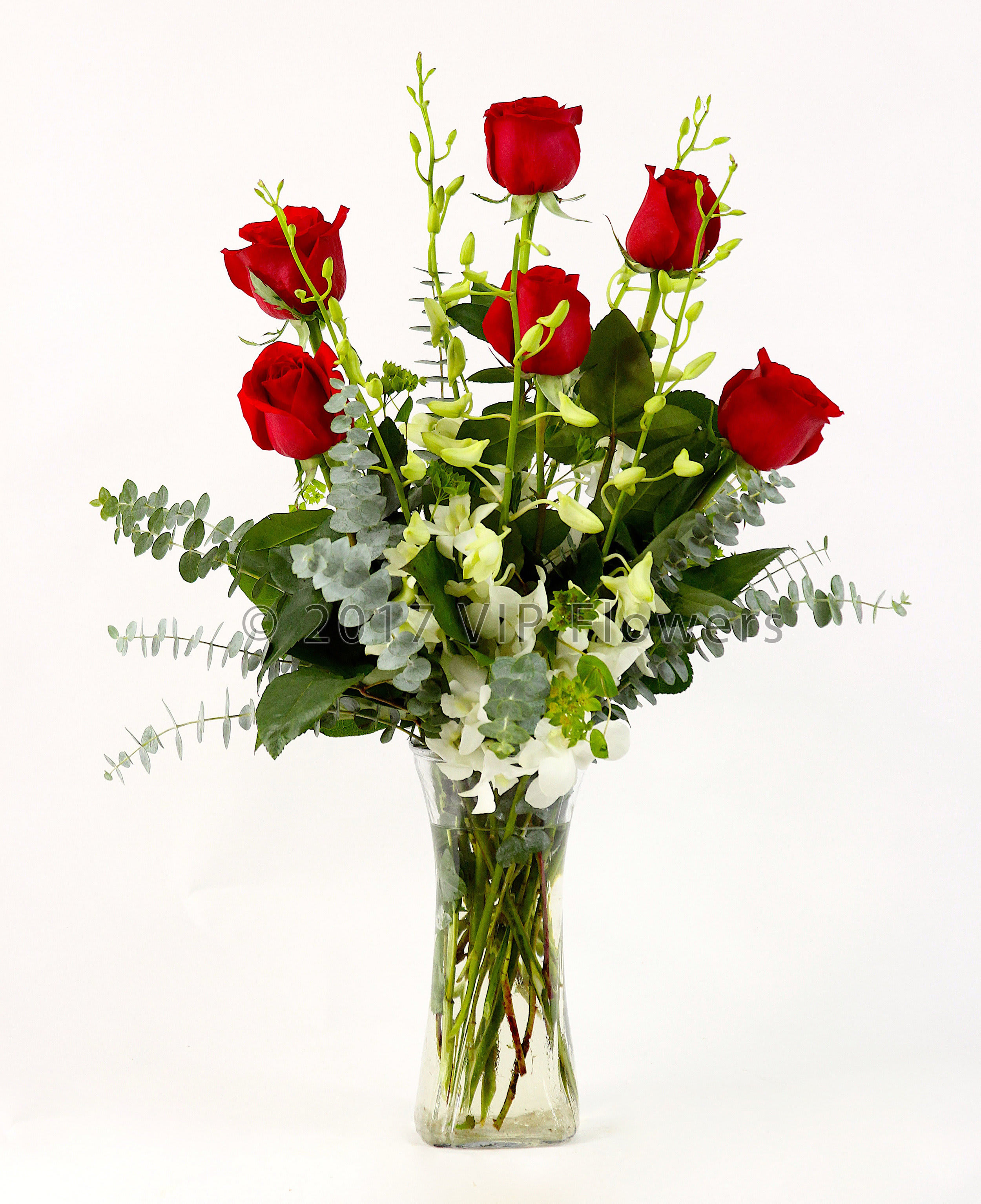 Giving of Love - Flowers Included:  Red Roses White Dendrobium Orchids Seasonal Greens    Substitutions may be necessary to ensure your arrangement or specialty gift is delivered in a timely manner. The utmost care and attention is given to your order to ensure that it is as similar as possible to the requested item (Please note that some flowers and colors may vary due to seasonality.)