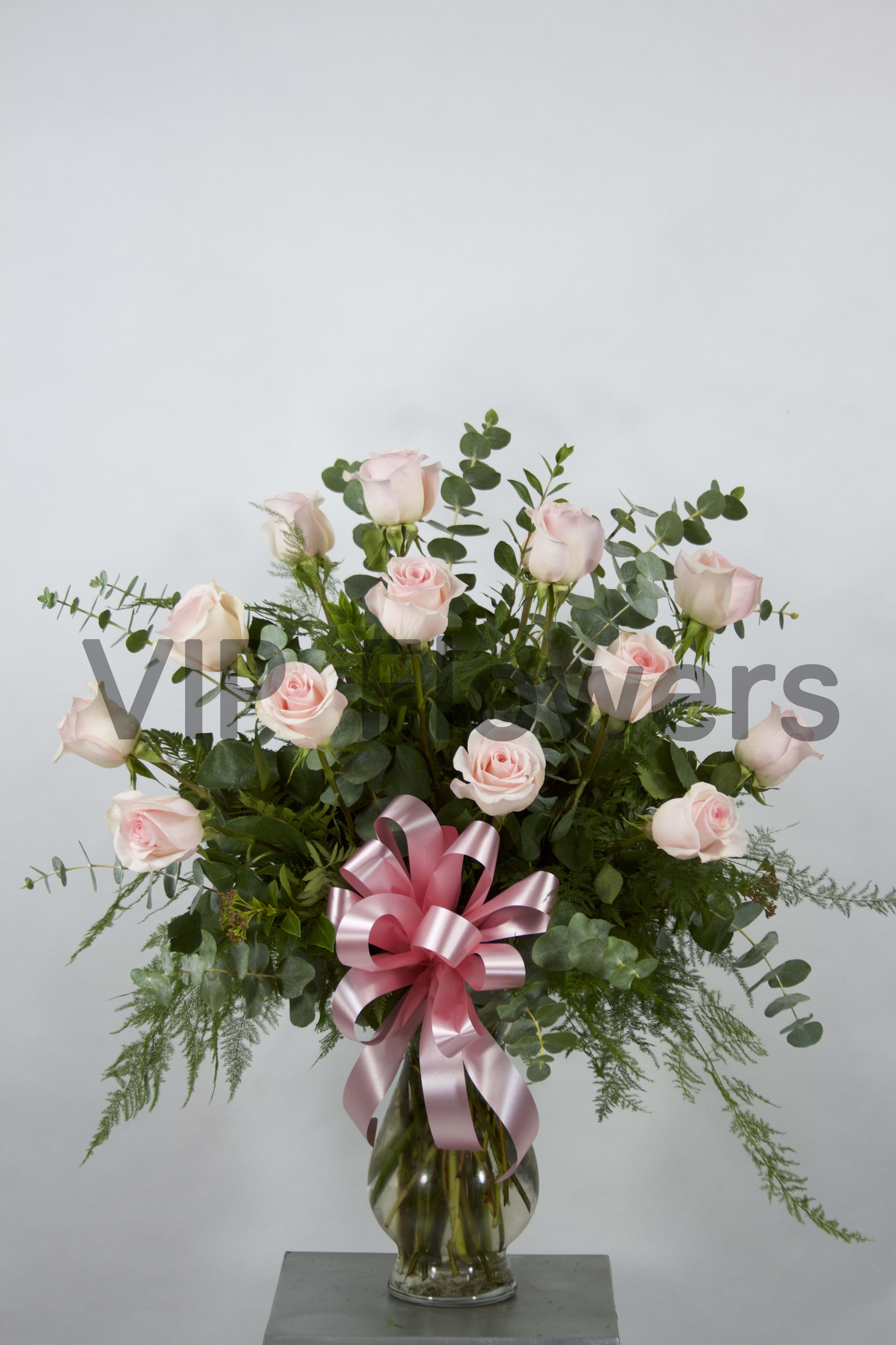 Pink Roses in Vase - Substitutions may be necessary to ensure your arrangement or specialty gift is delivered in a timely manner. The utmost care and attention is given to your order to ensure that it is as similar as possible to the requested item (Please note that some flowers and colors may vary due to seasonality.)