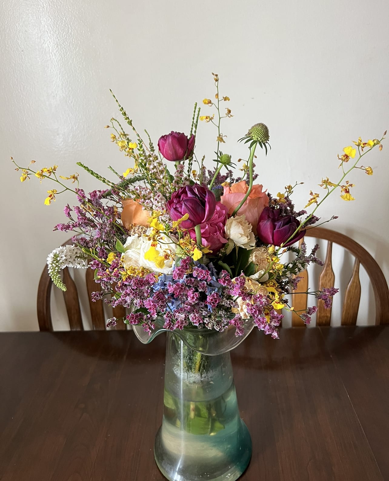Beyond Beauty - A lovely bowl of colorful roses brightens and lifts any room (and relationship!) A great gift for sending on Valentine's Day to your significant other, your friend, or even your mom!  Approximate Dimensions: 11''D x 11''H