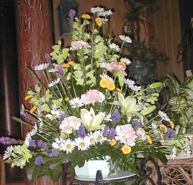 Sympathy Basket - Lilies, snapdragons, carnations, button poms, daisies, statice &amp; seasonal filler.28&quot;tall