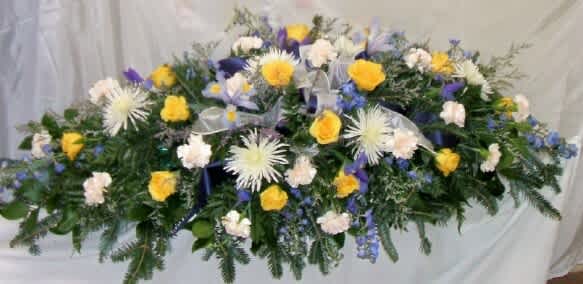 Full Couch with Roses - Full couch 1dz yellow roses, white fuji mums &amp; carnations, iris &amp; blue delphinium.