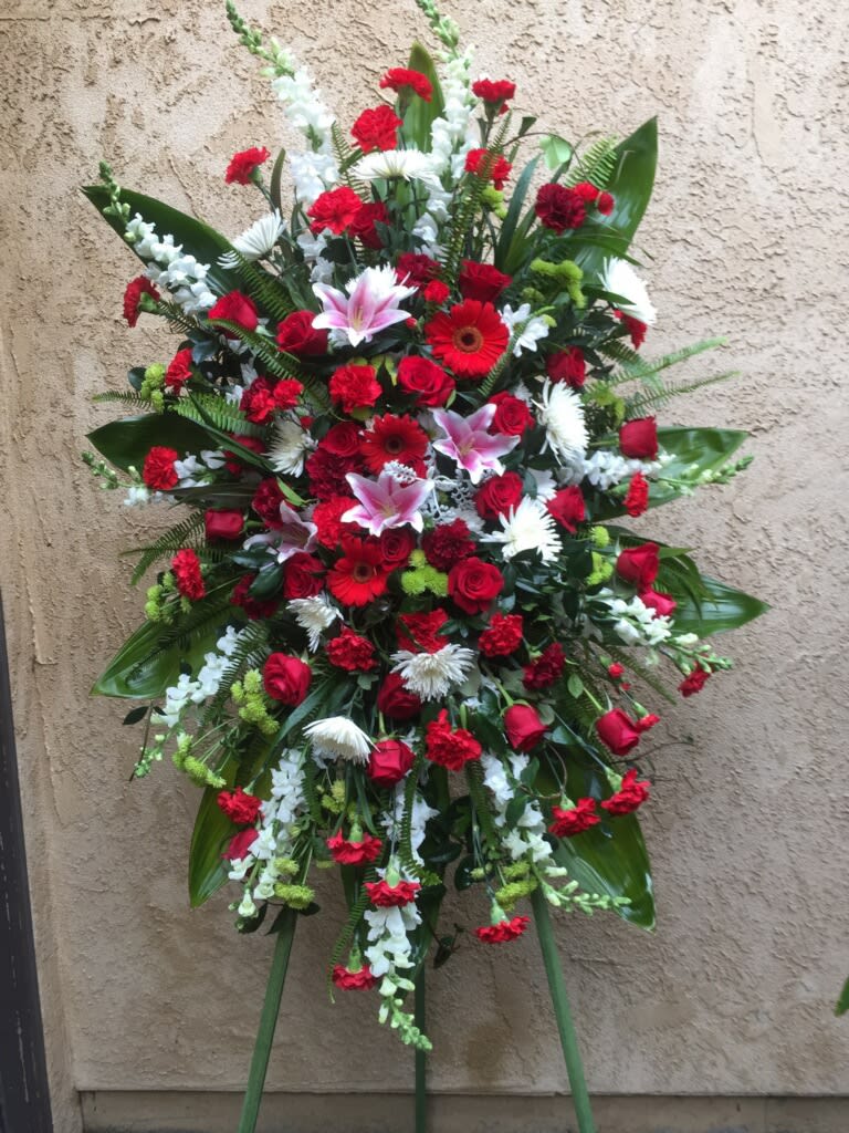 Funeral Spray 5 - Funeral spray with red and white flowers.
