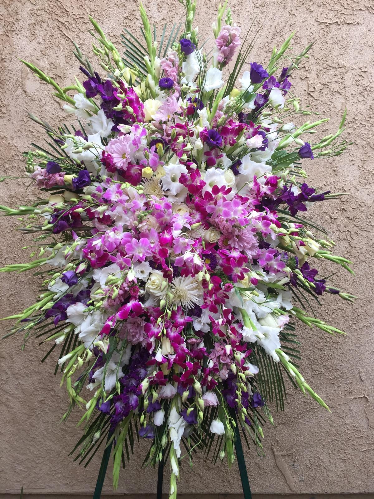 Spray 5 - standing spray of orchids, gladiolus and greens.