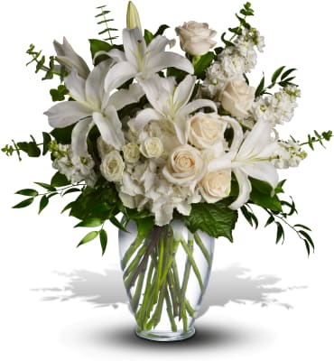Dreams From the Heart Bouquet -  A dreamy bouquet of white sympathy flowers is a comforting reminder of your love. The lush arrangement of soft colors is delivered in a majestic, tall glass vase.    Item # T208-1A 