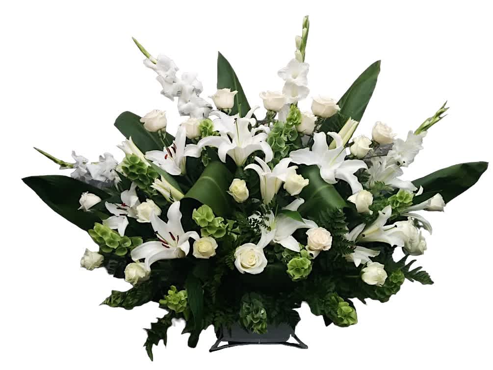 Peaceful Thoughts Basket - Peaceful Thoughts Basket includes: Green Chrysanthemums White Lilies White Roses White Gladiolus Bells of Ireland  This type of design usually measures approximately 3 ft x 3 ft and is meant for funeral services ONLY. This design includes a free banner (please include a banner sign in the Special Instruction Box or Message Box with the title “BANNER”).  In the event a banner space is left blank for any reason, ONLY a card message will be included. Banners are printed in a black 2.5-inch wide ribbon with silver ink. Currently, we don't offer any other colors. If the service is the same day as the order was placed we cannot guarantee delivery by a certain time. And flowers will be delivered during normal business hours.  To ensure the delivered flowers match the displayed photo as close as possible we recommend ordering 3-5 days in advance. For the same or next day deliveries, we reserve a right to substitute flowers with the same or greater value. Please read our substitution policies below.