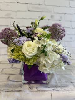 Purple Perfection Purple Perfection - Pure purple perfection in this beautiful arrangement consisting of purple, lavendar and white seasonal florals. Send one to your loved ones today!