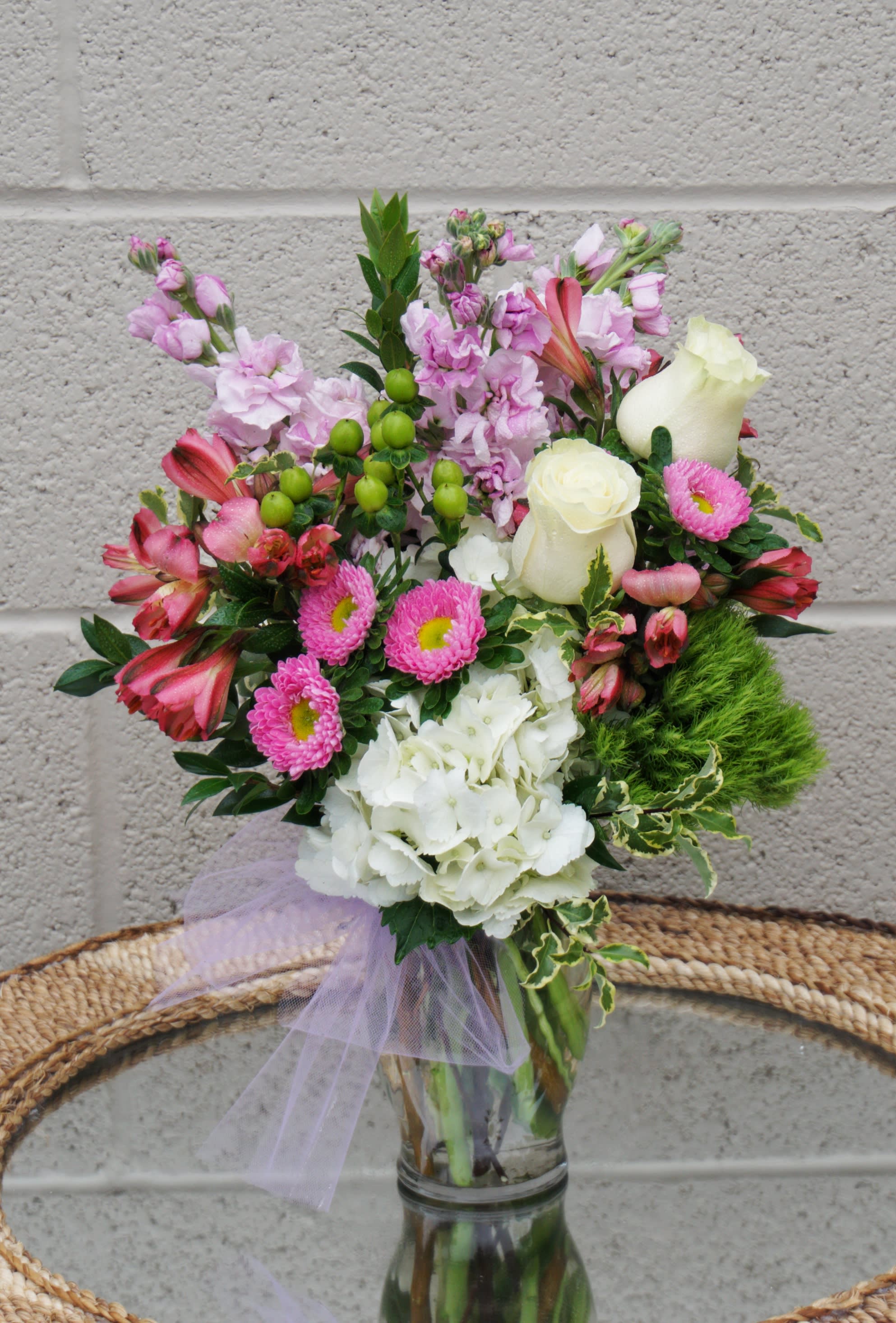 My Dear - A pretty design including hydrangea, fragrant stock, rose... and accents. STANDARD: FIRST PHOTO DELUXE: SECOND PHOTO PREMIUM: THIRD PHOTO