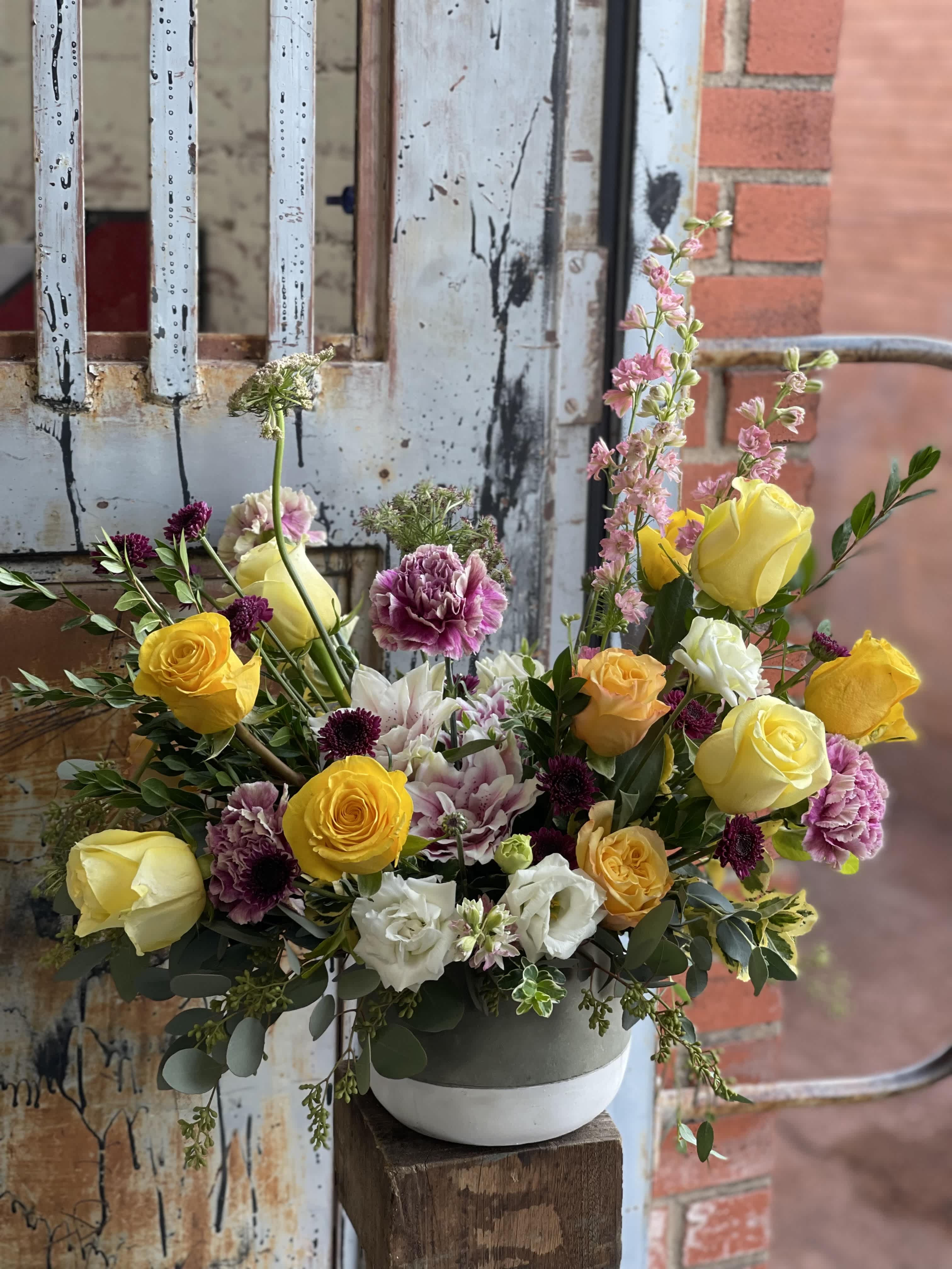 Honey Bee Bloom  - This arrangement is uniquely crafted with bright yellow blooms. Florals may vary depending on product availability.
