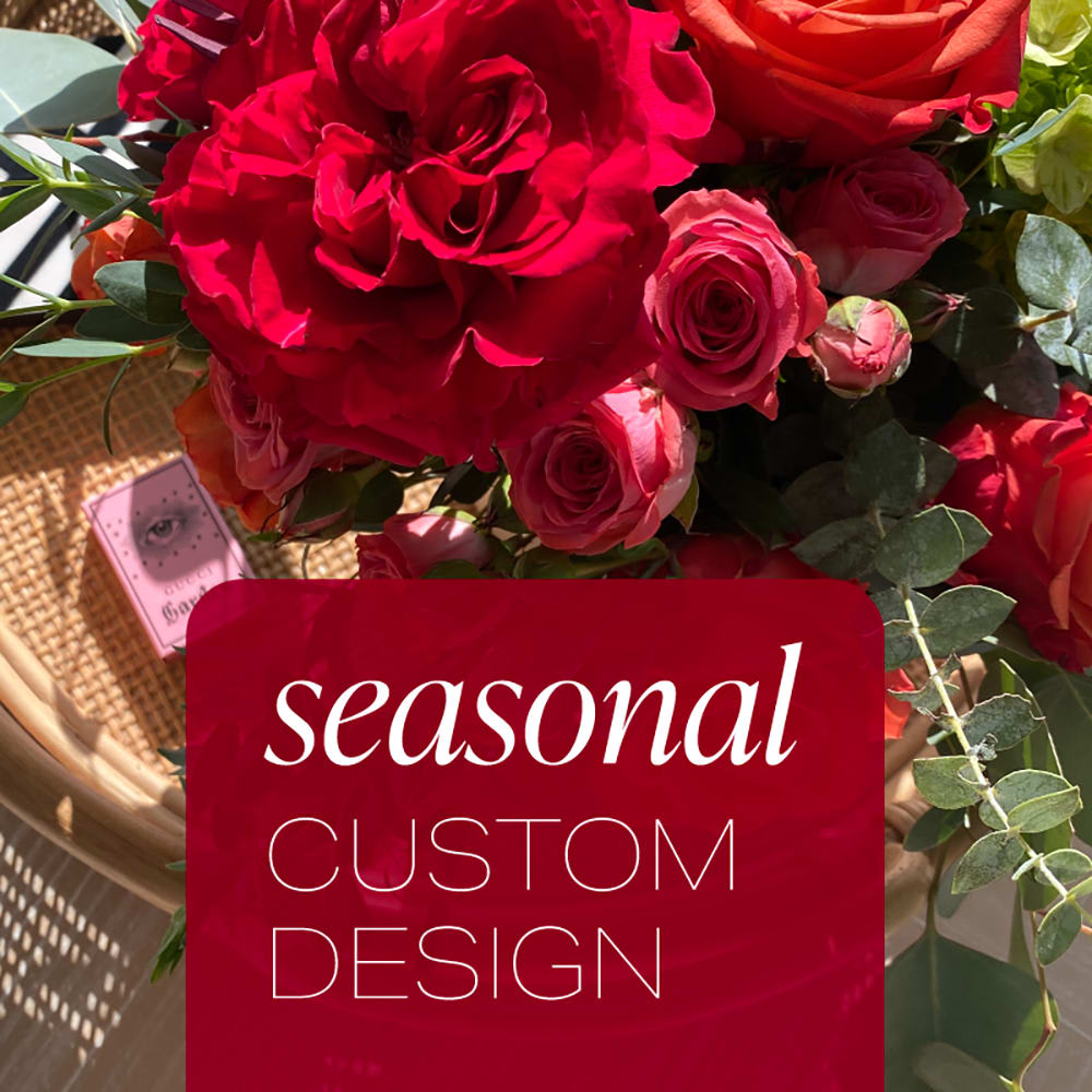 Seasonal Designer's Choice Seasonal Designer's Choice - Let us design the perfect, seasonal arrangement for you! Our shop creates custom flower designs to meet your specifications for a special sentiment or occasion.