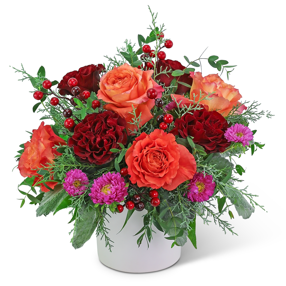 Luminous Glow - The vibrant colors in this arrangement are sure to brighten up any space. Luminous Glow features premium roses, Matsumoto Asters, and the perfect touch of winter foliage. This non-traditional winter flower design is the perfect holiday flower arrangement for a gift or just to add fresh flowers to your holiday home decor. We specialize in local flower delivery and take pride in our unique flower designs and excellent customer service.