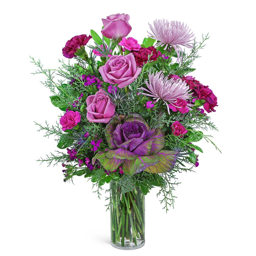 Frosted Wildberry - This artistic flower design will brighten anyone’s day! Frosted Wildberry contains roses, spider mums, carnations, and dianthus accented with a variety of winter foliage. This unique flower arrangement is truly fresh and fabulous and will add a purple pop of color to anyone's home or office. Send these beautiful flowers to celebrate a birthday, anniversary, or any occasion. We offer same-day flower delivery in most cases.