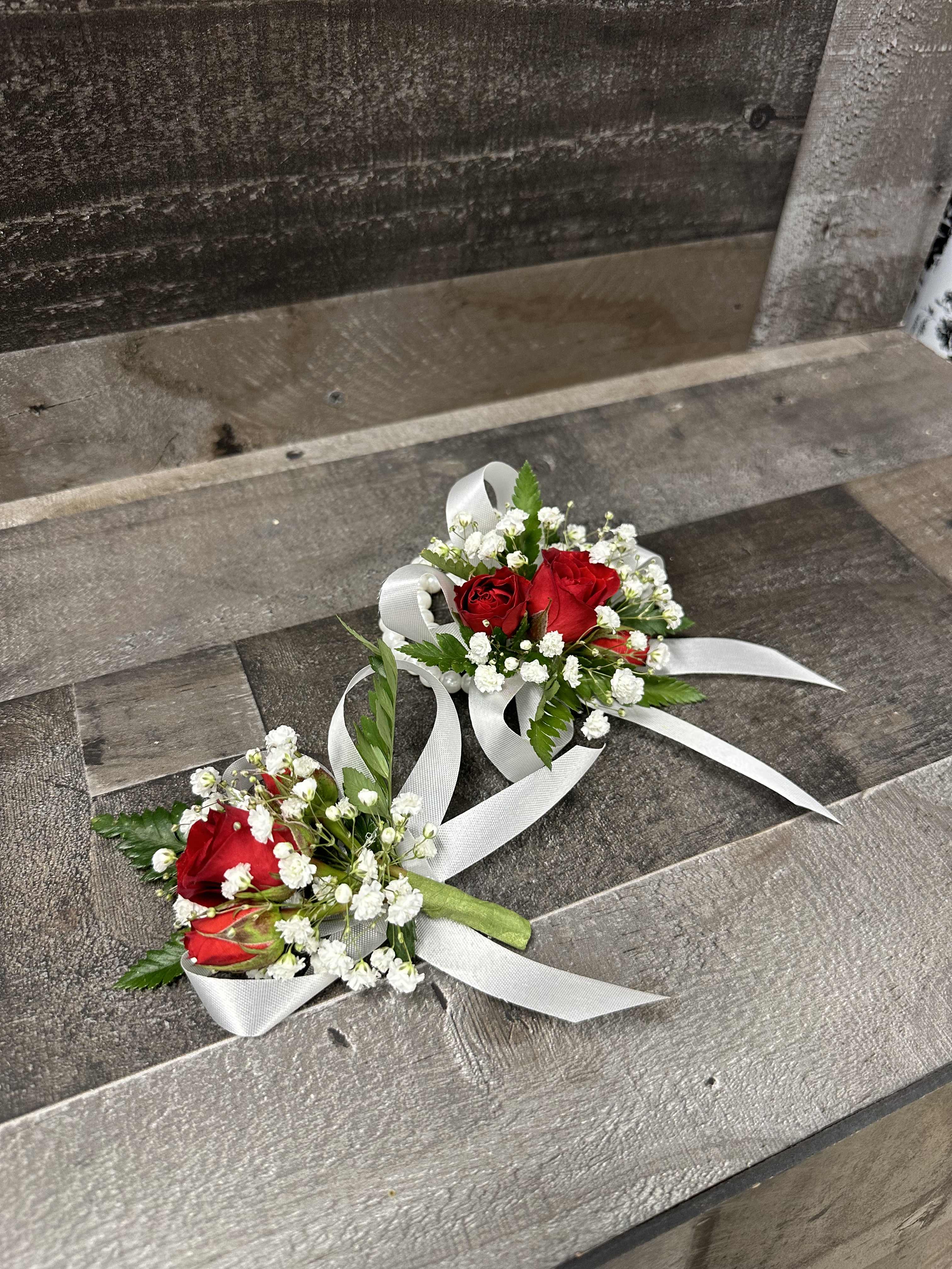 Red Corsages &amp; Boutonnieres - A matching wrist corsage and pin on boutonniere. Perfect for a couple going to homecoming, prom, wedding or any school dance! We match the corsage and boutonnière so they go perfectly together!
