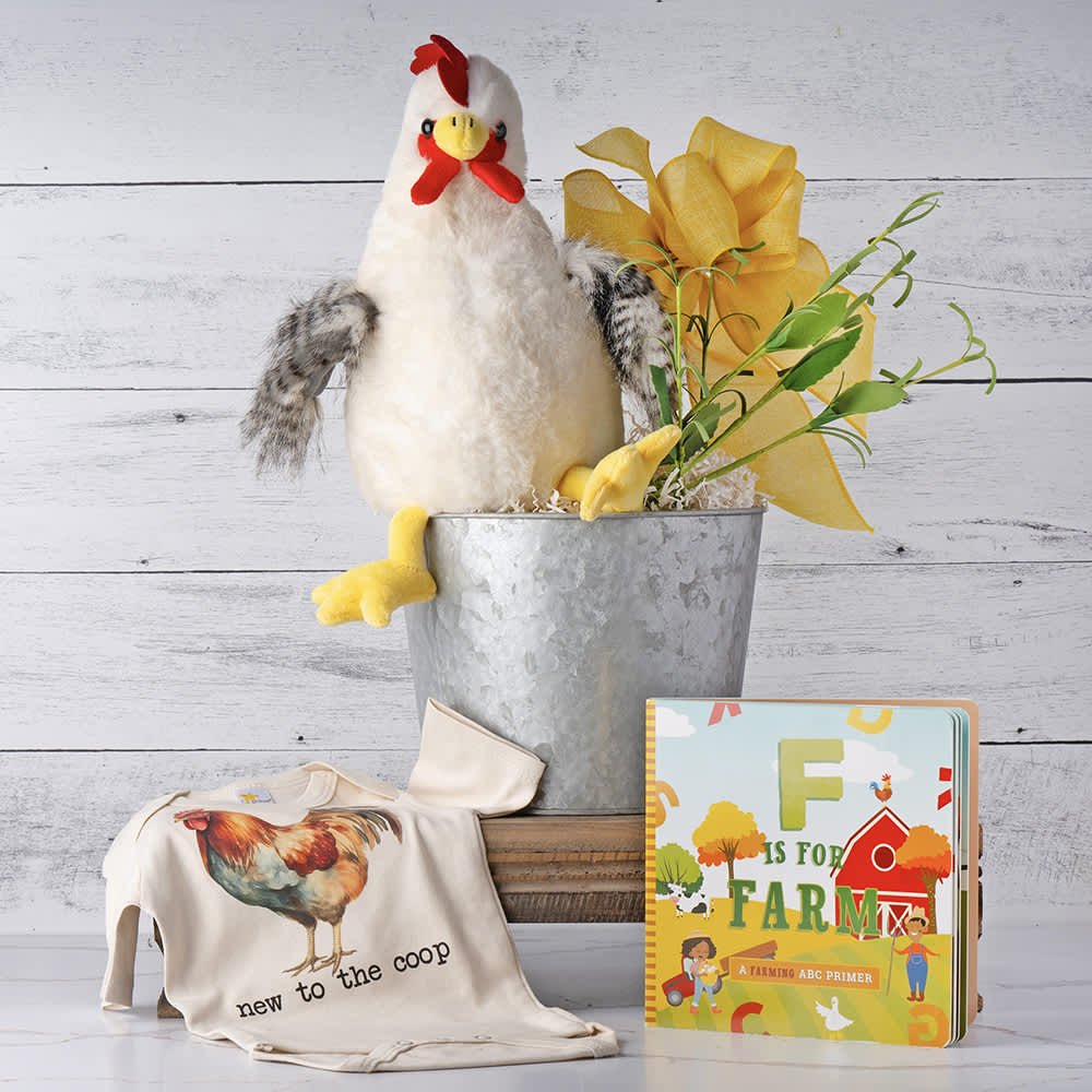 Welcome to the Coop Baby Gift Basket Welcome to the Coop Baby Gift Basket - Celebrate the arrival of the little one with our charming farmyard friends gift basket. This delightful set features an adorable plush rooster, ready to become baby's new best friend, and a cozy onesie with the playful message "Welcome to the Coop," adding a touch of farm fun to their wardrobe. To inspire a love of reading, we've included the enchanting book "F is for Farm," perfect for cozy storytimes. Thoughtfully curated, this gift basket is the perfect way to welcome the newest member of the family with warmth and joy. Contents: 12" Chicken Plush, "New to the Coop" Baby Bodysuit, 'F is for Farm' Book, Greenery