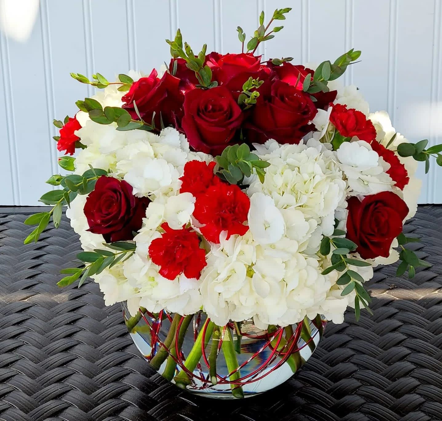 Celebration  - Hydrangeas and dozen red roses in 8&quot; bubble bowl. If you would like to say &quot;You are Amazing&quot; this is bouquet for you! Great for Birthday, Anniversary, Valentines Day or any other occasion.