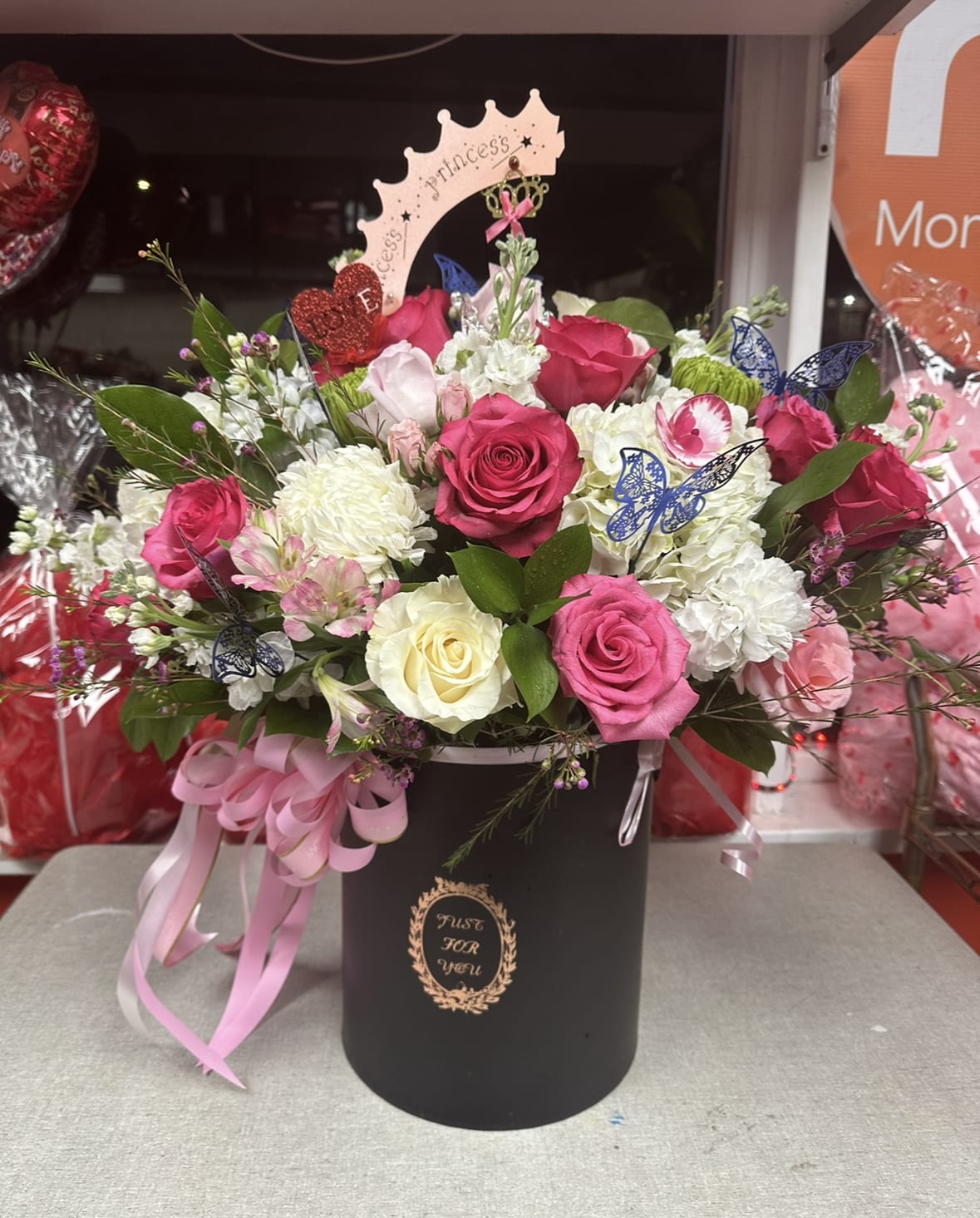 Mixed Arrangement in a Box Mixed Arrangement in a Box - Surprise your loved one with this thoughtful and elegant arrangement featuring pink roses, white mixed flowers in a high quality and stylish box.