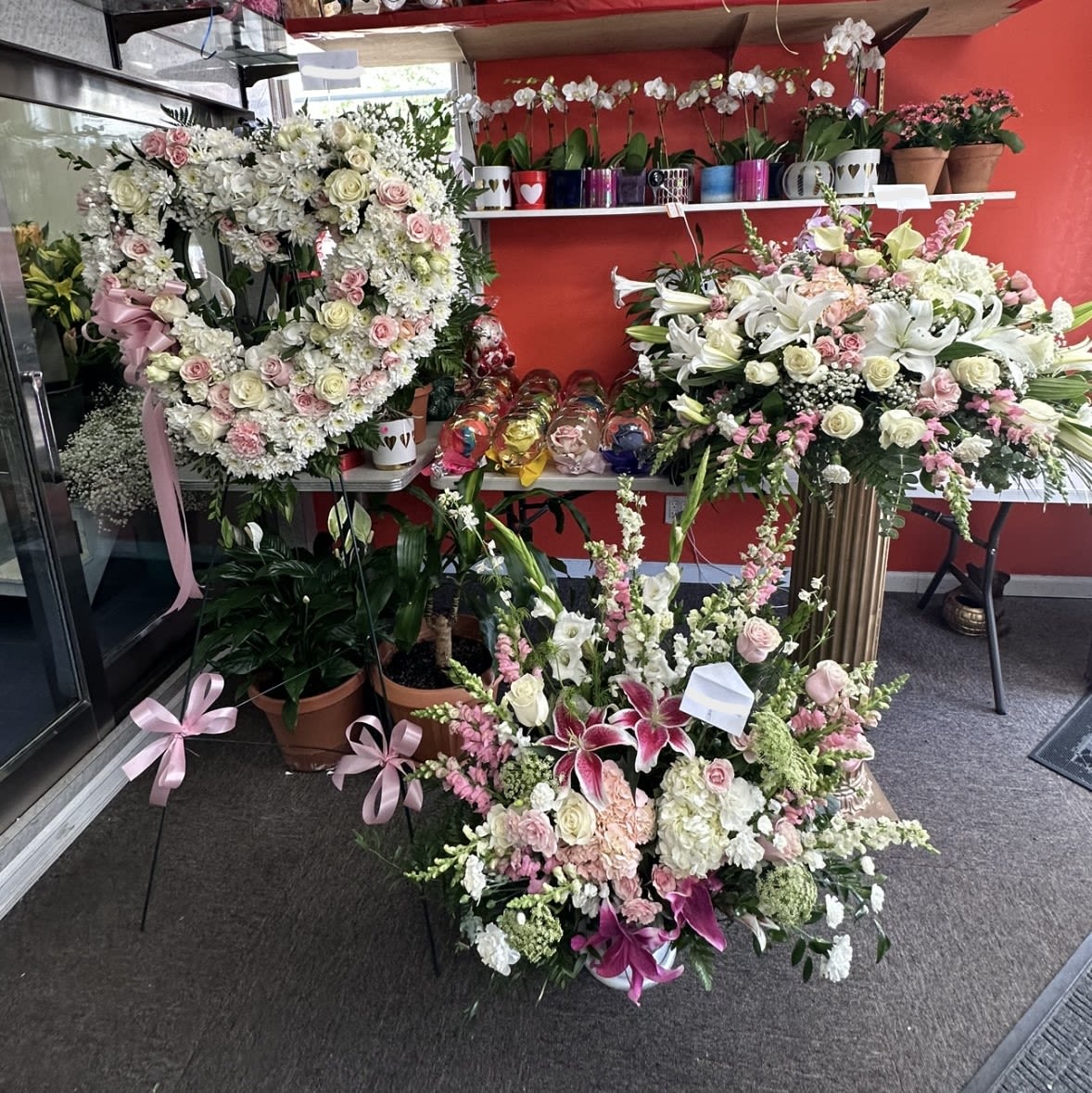 Sympathy Collection Set Sympathy Collection Set - Save time and stress by selecting this bundle which includes one large standing spray in the shape of a heart, a large casket arrangement, and a large basket arrangement. Arrangement available in other colors, please call to indicate your choice of color.