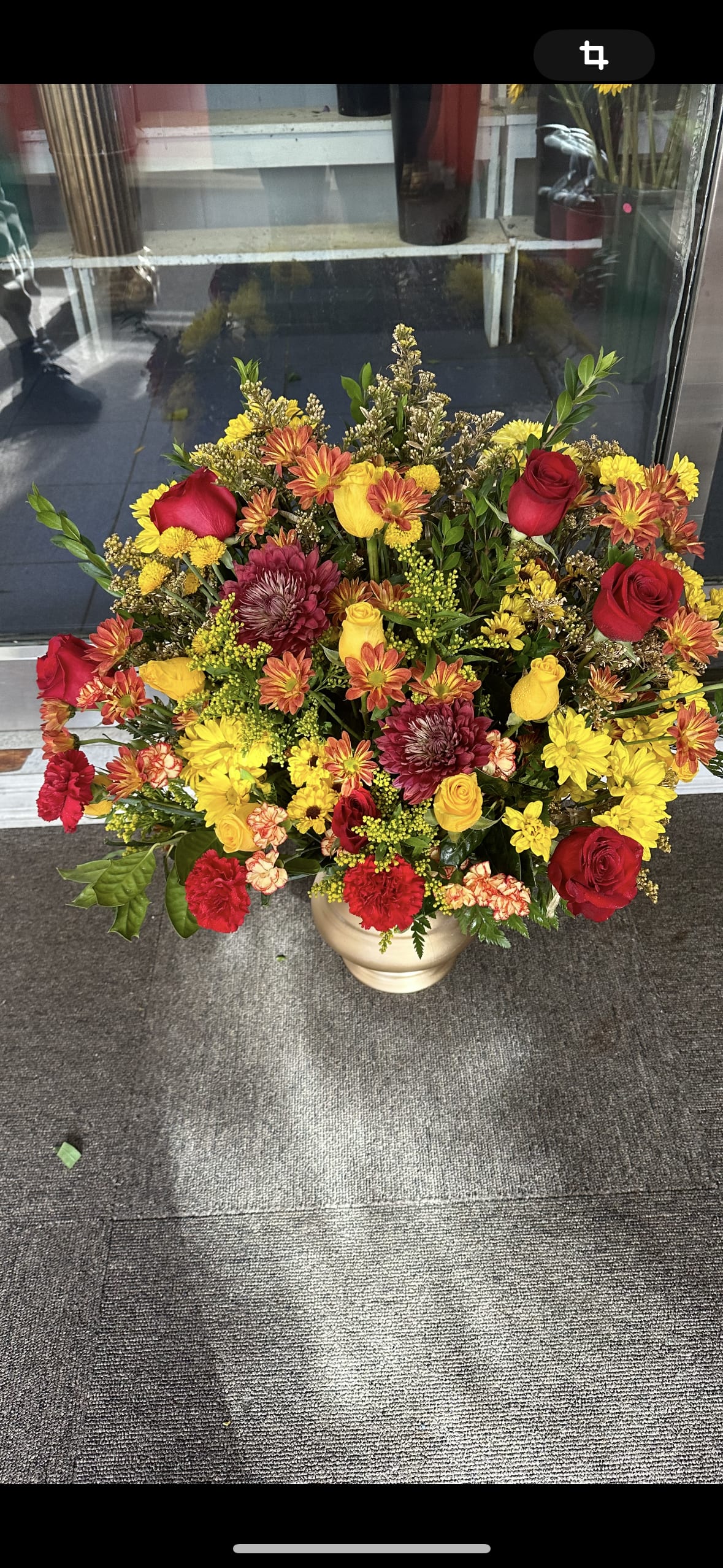 Red and Yellow Basket Red and Yellow Basket - Show your support by selecting this basket which contains an assortment of flowers such as roses, and carnations.