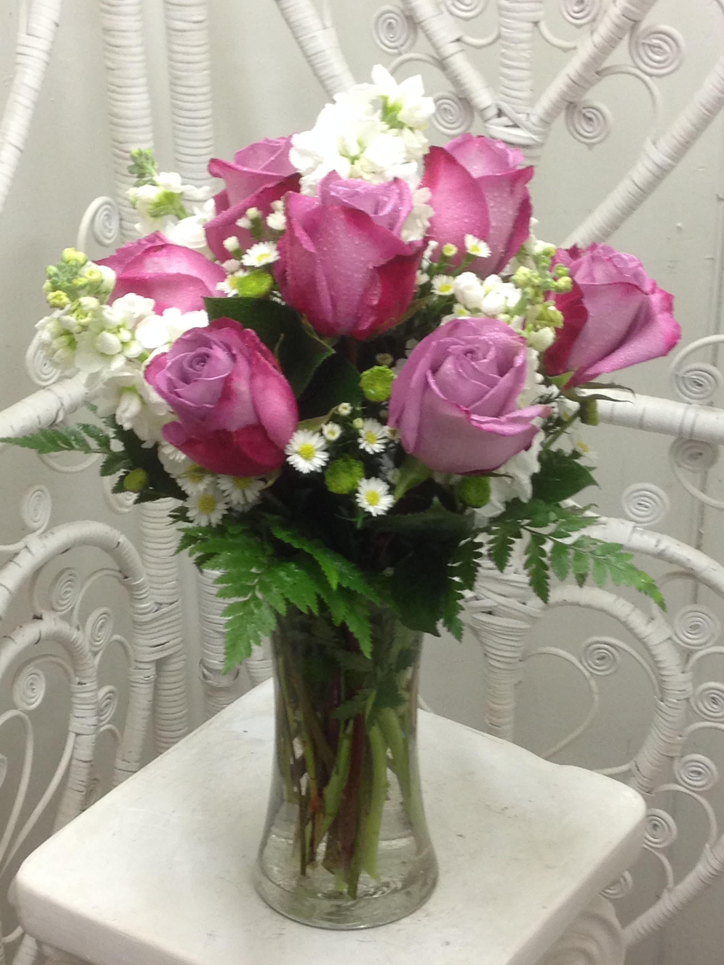 Sweet Emotion Sweet Emotion - Lovely lavender roses with sweet, fragrant stock combine for a full, beautiful, expressive arrangement