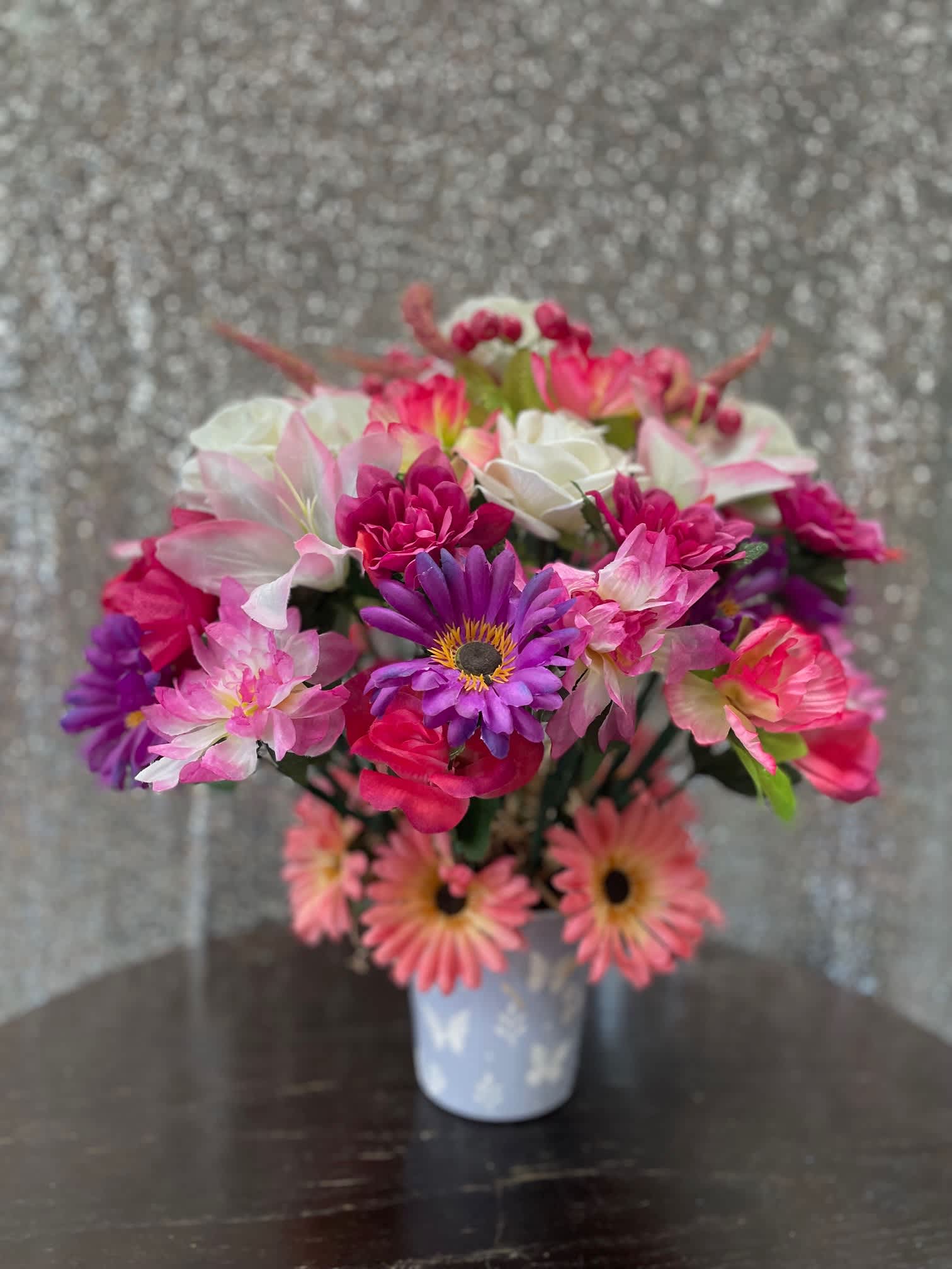 Pink Beauty Pink Beauty - This glamorous bouquet of pink, purple, and white guaranteed to bring smiles and good feelings of love.