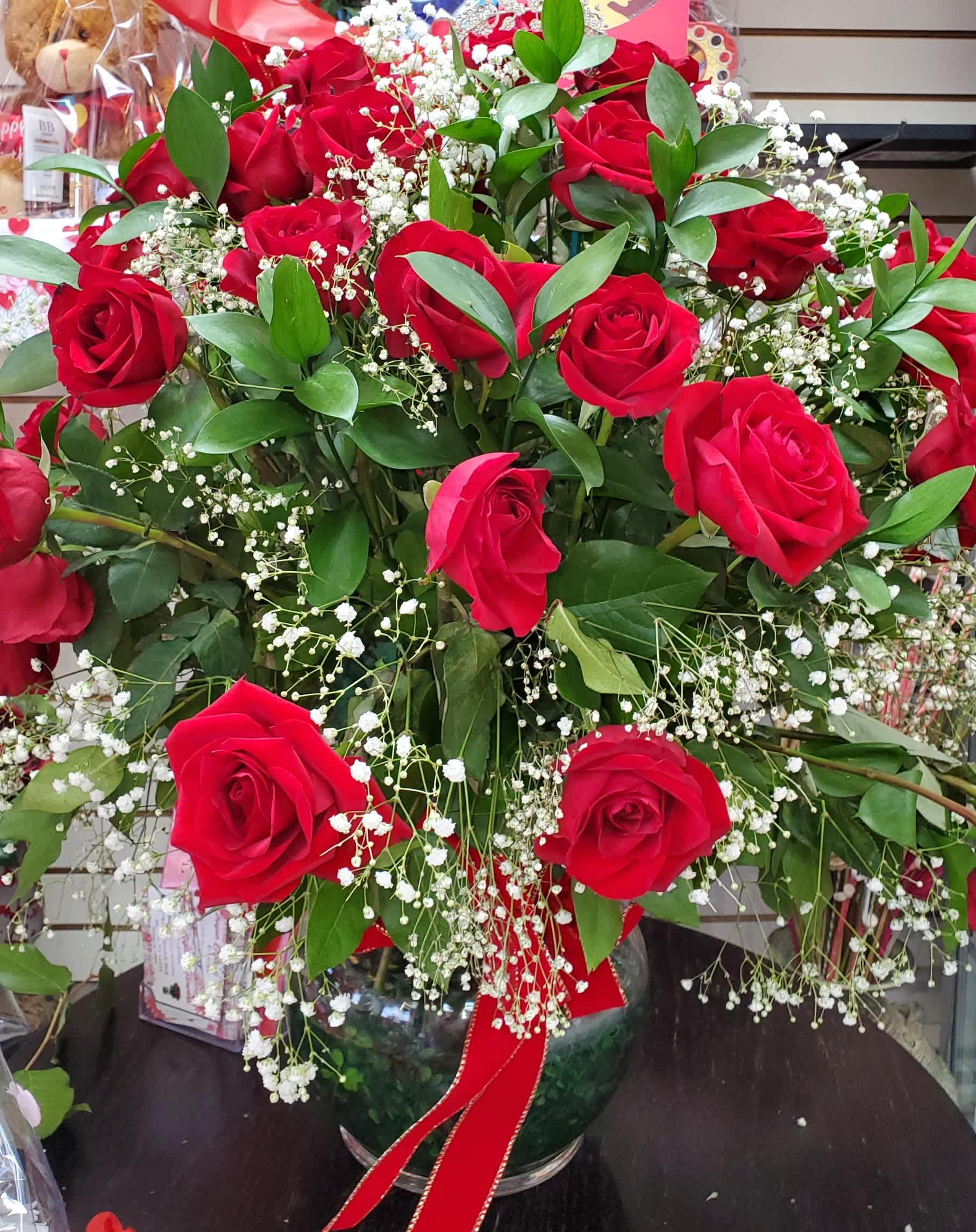 RED PASSION RED PASSION - Indulge in the epitome of romance with our Red Passion bouquet—three dozen breathtaking roses that ignite flames of passion and desire.