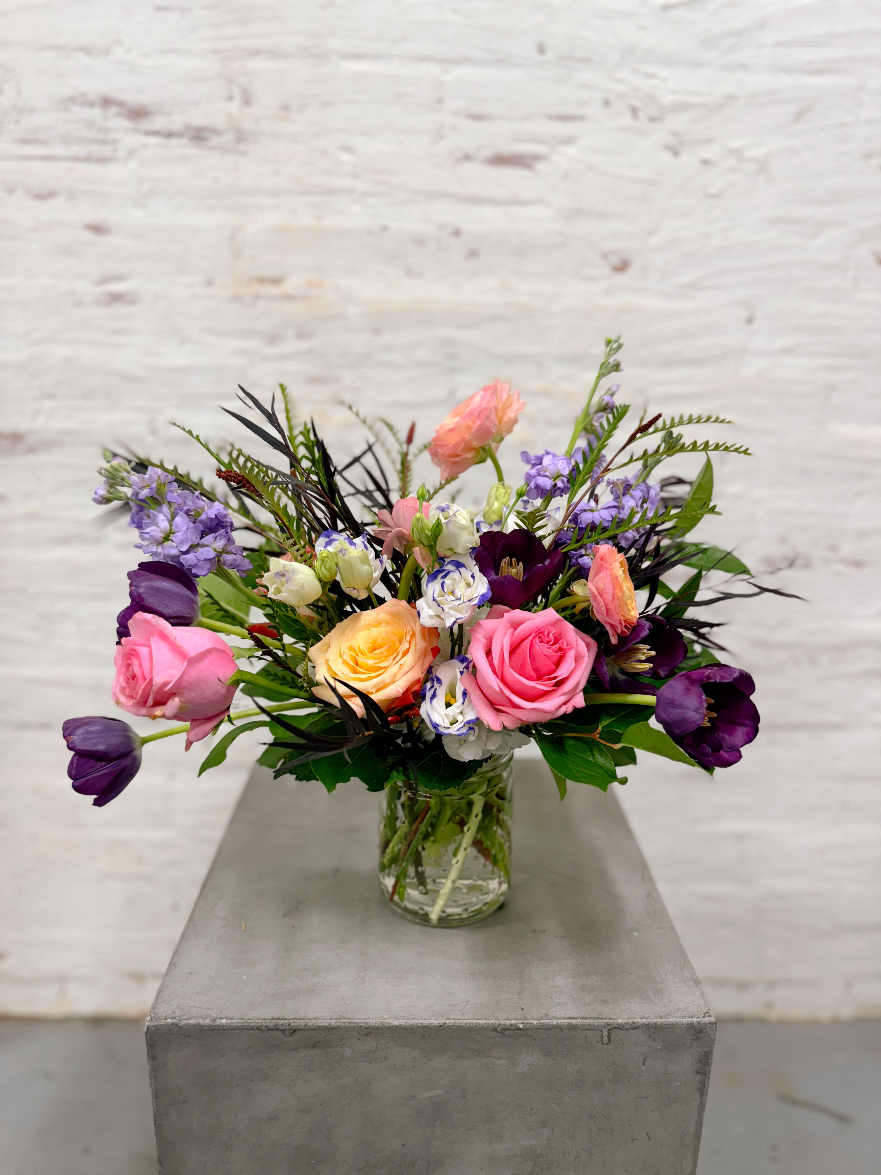 True Love  - This arrangement is uniquely crafted with bright and fresh florals. Arrangement and vase may vary depending on product availability.