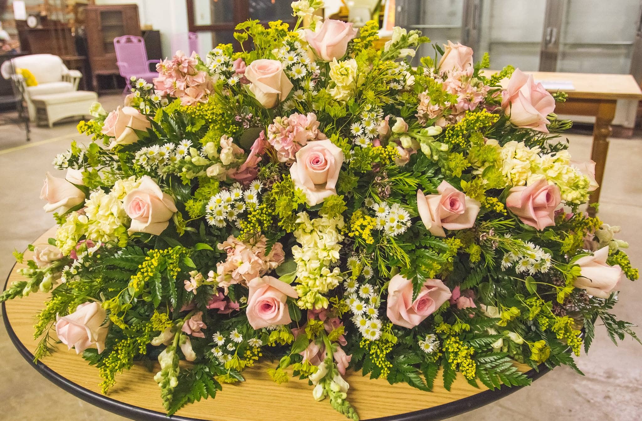 Bella Bella - Beautiful spray arrangement of Roses, Stock, Asters and various filler in a soft and sweet color palette.