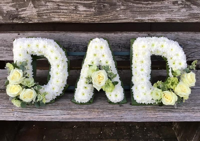 DAD WHITE TRIBUTE DAD WHITE TRIBUTE - Beautiful white arrangement with roses detail. If you wish to change roses color, please ask for required color in the message section at checkout (Change subject to availability) This item requires 3 days notice to order.