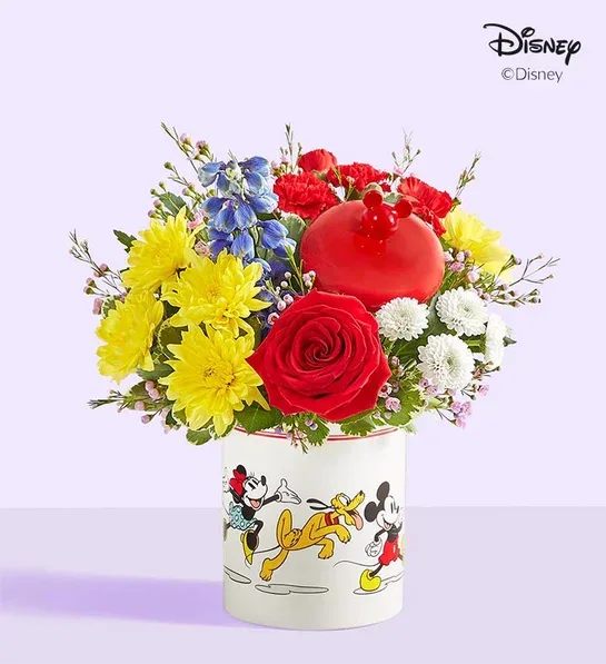 Mickey Flower Jar - Share a gift full of character(s)! Part of our new Disney collection, our handcrafted bouquet is gathered in classic colors and designed in our whimsical Mickey Mouse and Friends cookie jar, featuring iconic animations. Great as a keepsake container or to keep your favorite treats, it’s a sweet and nostalgic surprise for every Disney fan.