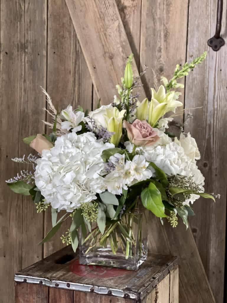 Beth's Sweet Hydrangea Bouquet Beth's Sweet Hydrangea Bouquet - A beautiful low and lush floral design to send in shades of white and blush for a perfect gift for someone special