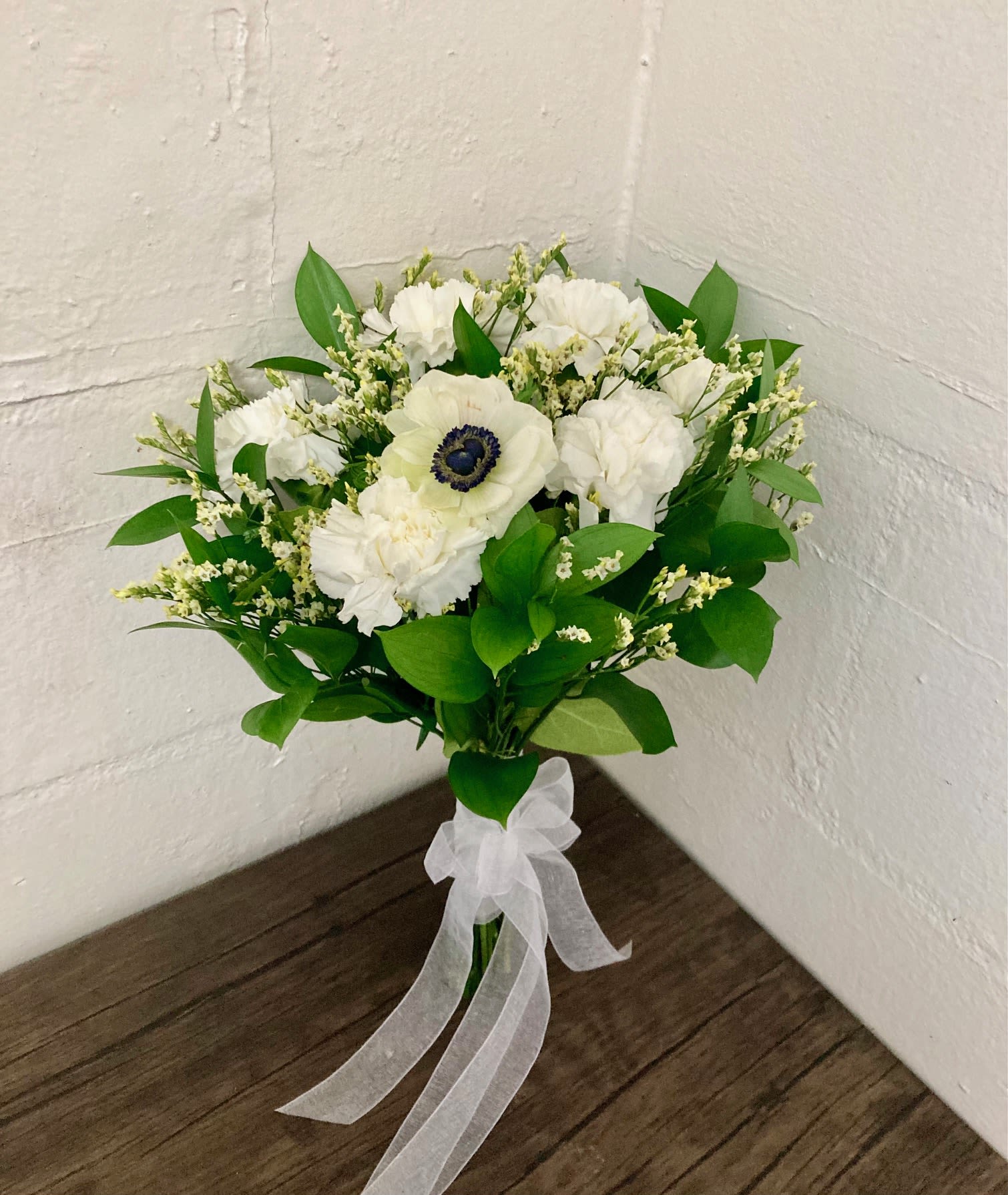 Pure Delight - Collection of white blooms, carefully arranged to evoke a sense of purity and elegance.