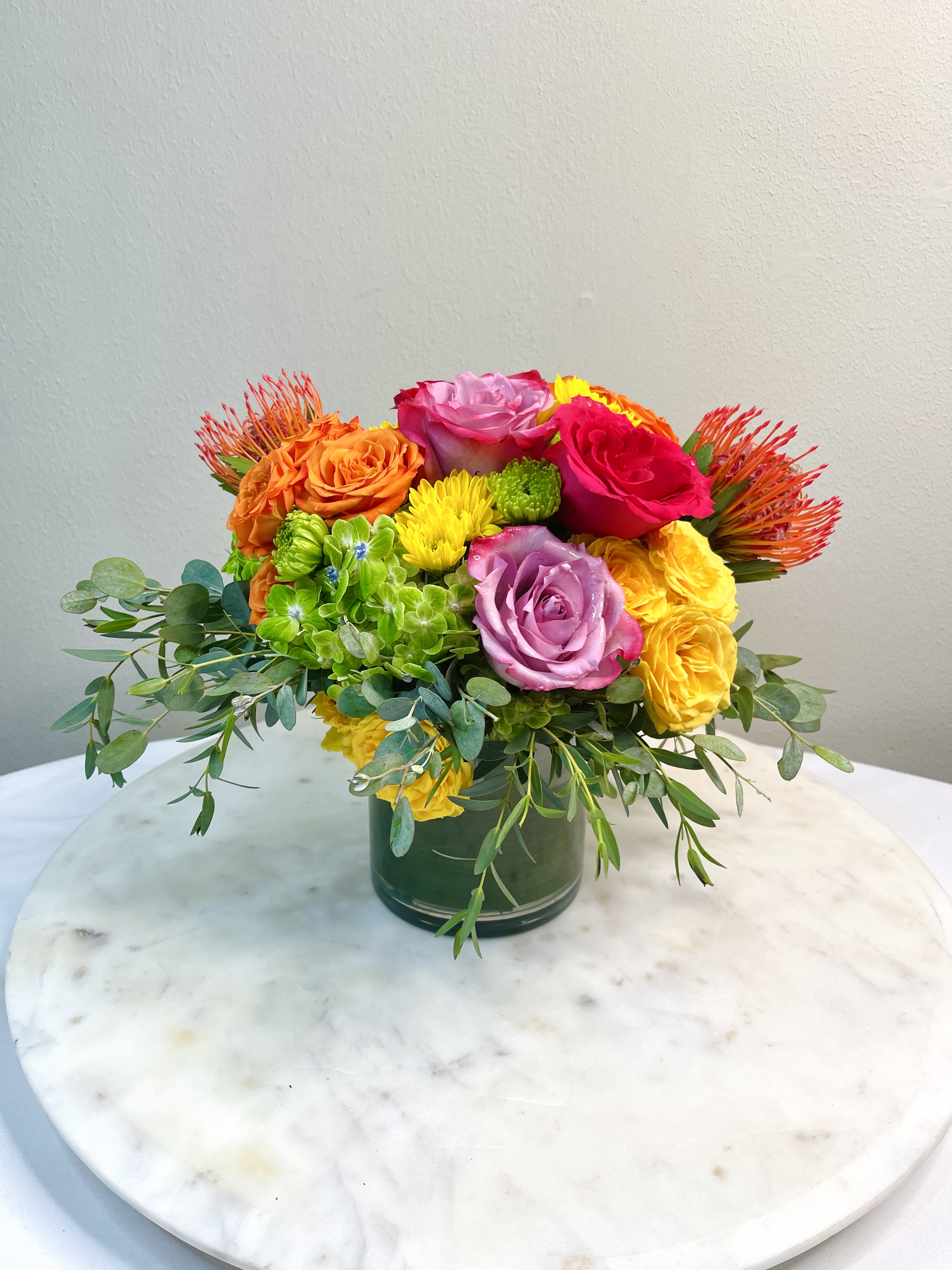Fiesta Time! - A bright and festive blend of vibrant fiesta colors. From every angle, you can see a party! This works great as a wonderful gift, or table centerpiece.  