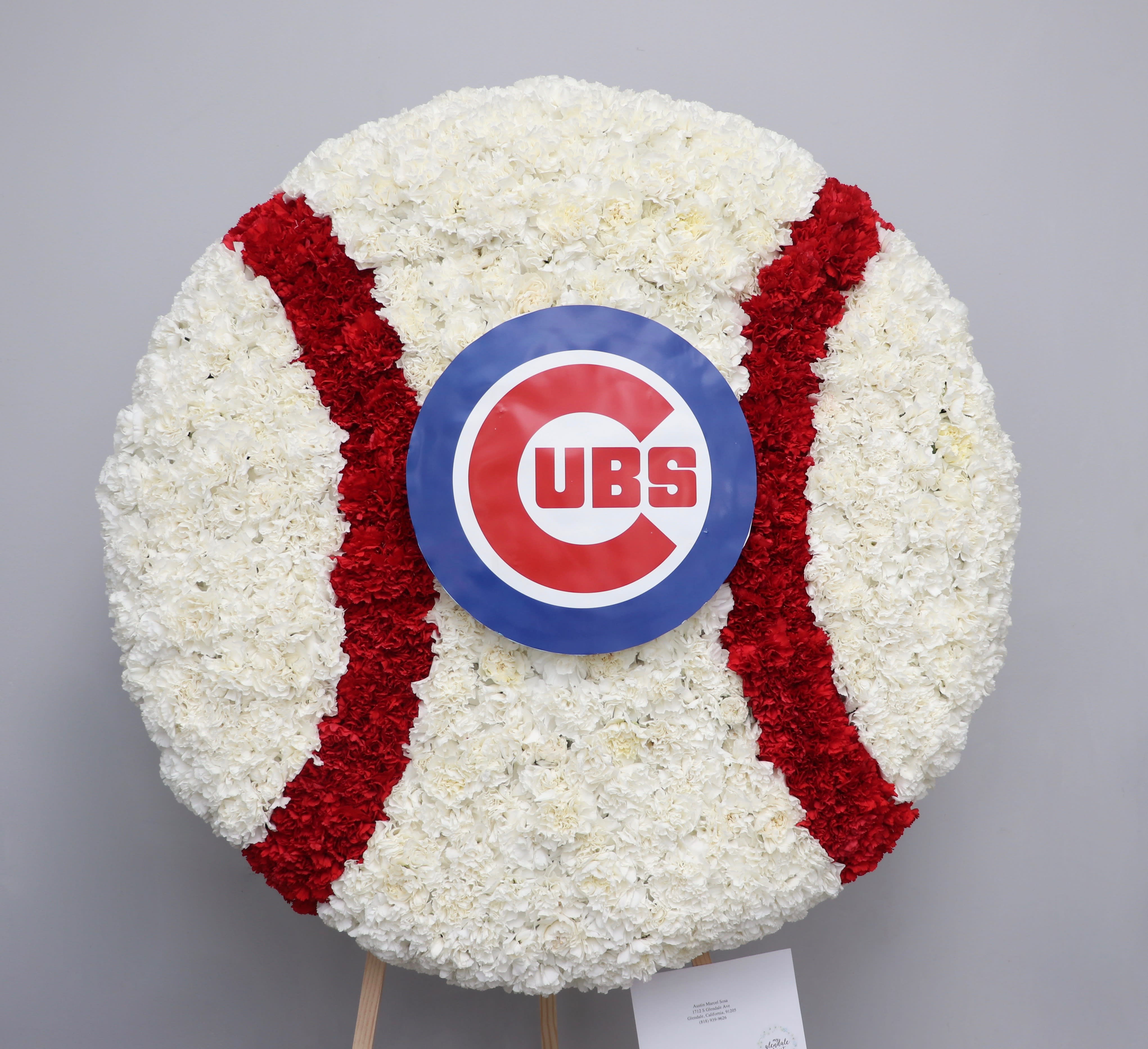 Ball Wreath  - This full wreath contains custom flowers . The standard size is approximately 30 inches wide, deluxe is approximately 36 inches wide, and premium is approximately 42 inches wide. Contact us to determine what type of ball you would like.     We include easel, printed banner, and delivery (some fees may apply). An additional banner can be added for $15
