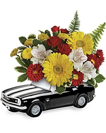 Chevy Camaro Bouquet - Vroom vroom! Get Father's Day rolling with this cheerful yellow and red bouquet, arranged in the coolest black vintage Camaro. He's sure to get a kick out of the fun-filled ceramic keepsake! 