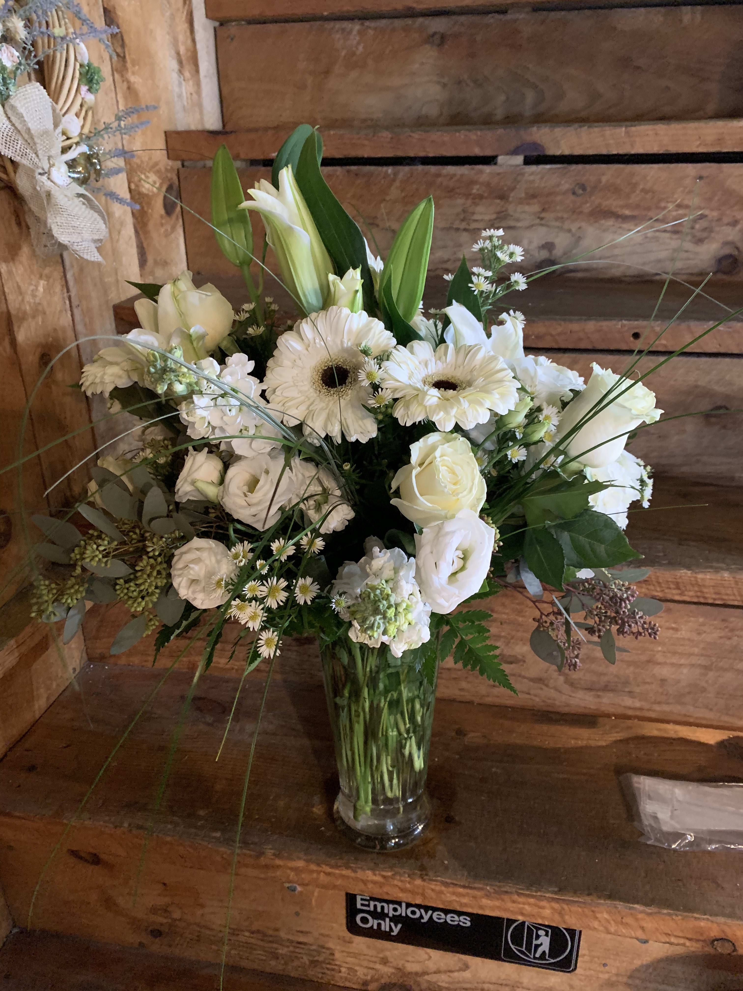 All White Beauty Bouquet All White Beauty Bouquet - This Gorgeous and elegant bouquet is a perfect way to express your sentiment.