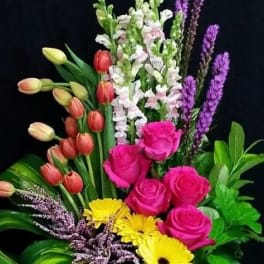 European Clustering Garden Luxury Bouquet - A Beautifully artistic display of flowers arranged in a European influenced design. This upscale arrangement is a perfect way to send comforting thoughts. Flowers will vary according to season.