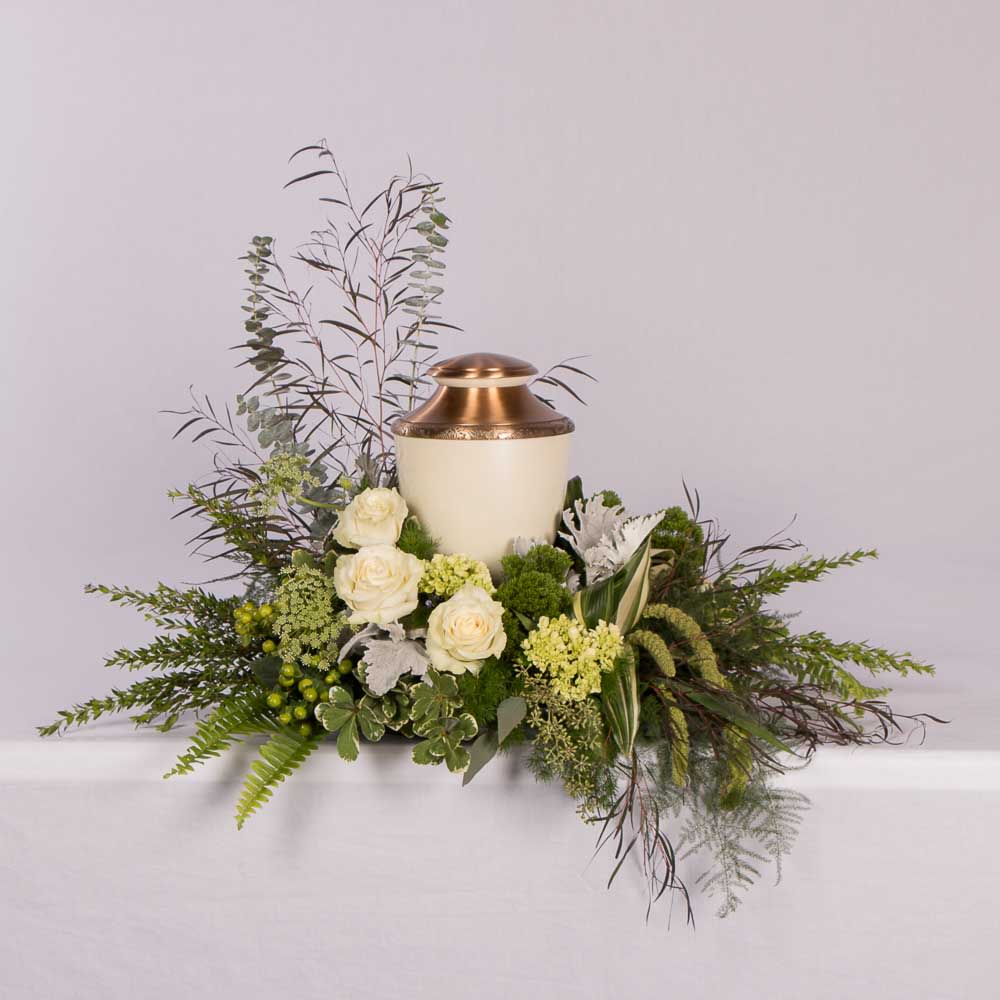 Green and white Cremation Urn Green and white Cremation Urn - This classic look will be perfect to adorn your loved ones Urn.