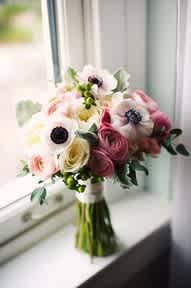 Romance in Bloom - Hand tied bouquet-white anemones, pink ranunculus, cabbage roses, green Hypericum berries and dusty miller