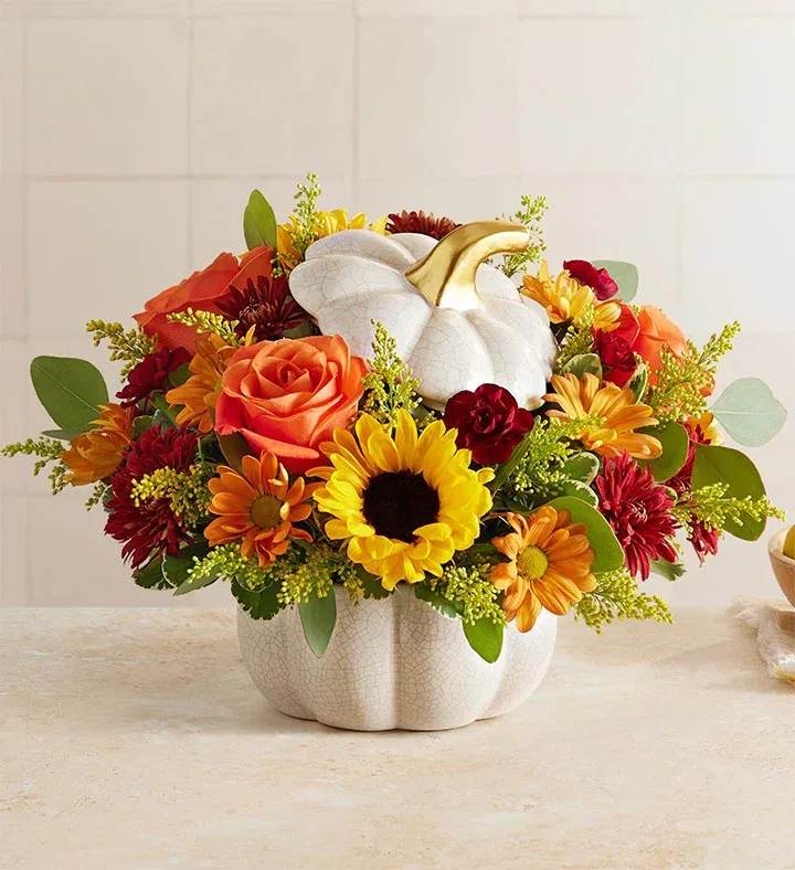 Thanksgiving pumpkin - Your choice of pumpkins in a white or orange pumpkin.  These beautiful pumpkins would make a great center piece in your home this Thanksgiving.  You can also order your for a family or friend.  We ship everywhere Nationwide.  